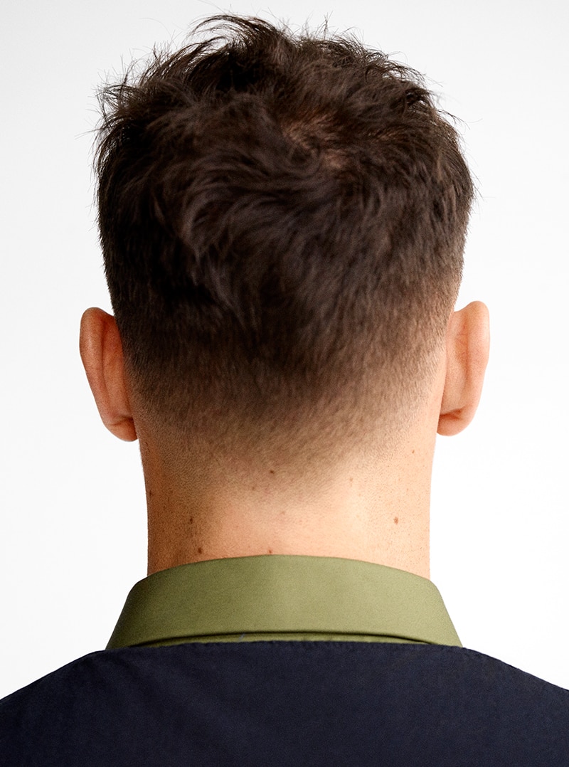 Hairstyle for men with longer hair on top and brushed back sides on Craiyon