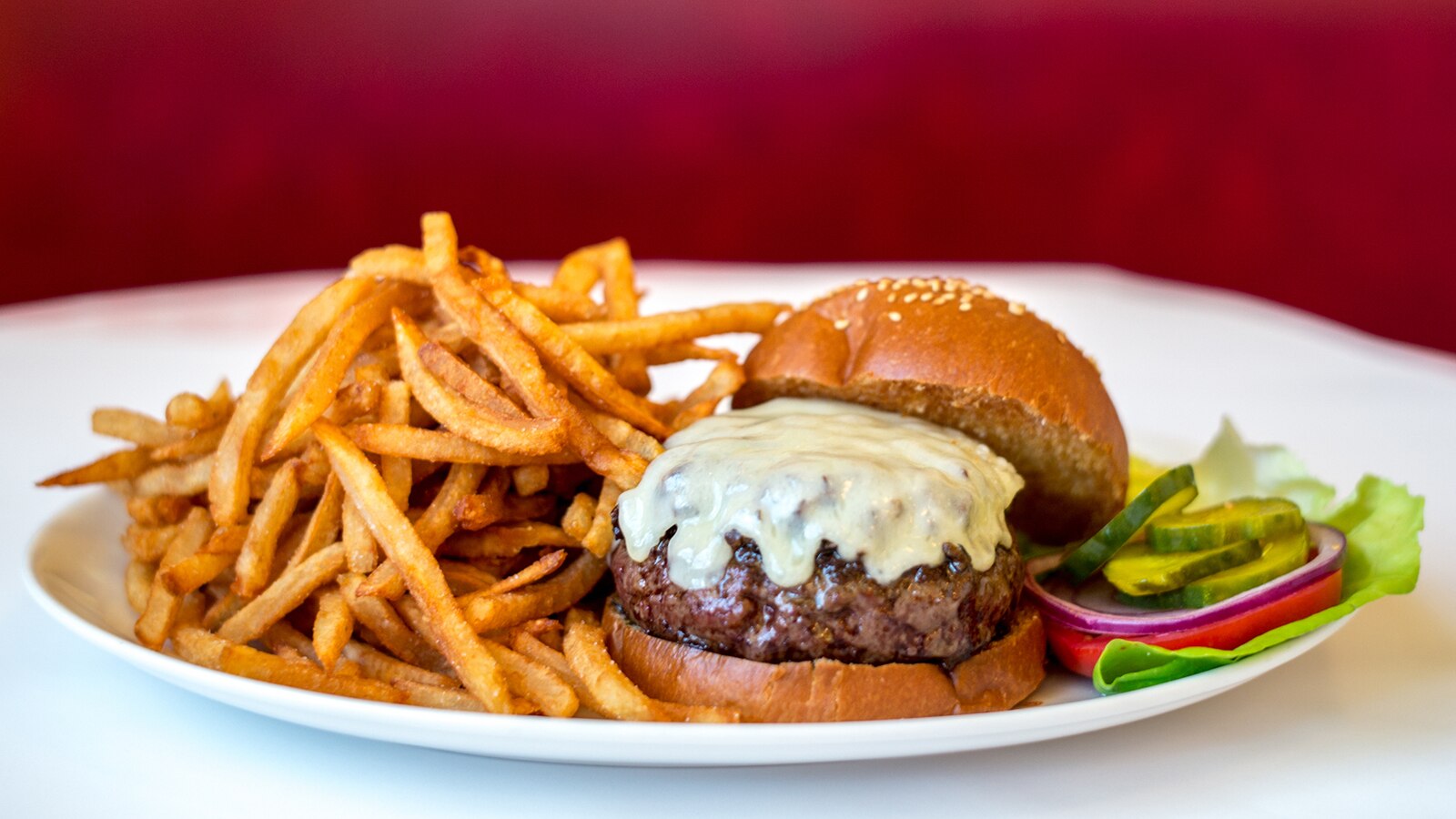 Peaky Blinders Manchester - Peaky Signature Burger ⁠ Ground brisket &  chunk steak patty, golden caramelised onions, black wax cheddar, shredded  lettuce and Peaky burger sauce. Perfectly paired with a cold pint