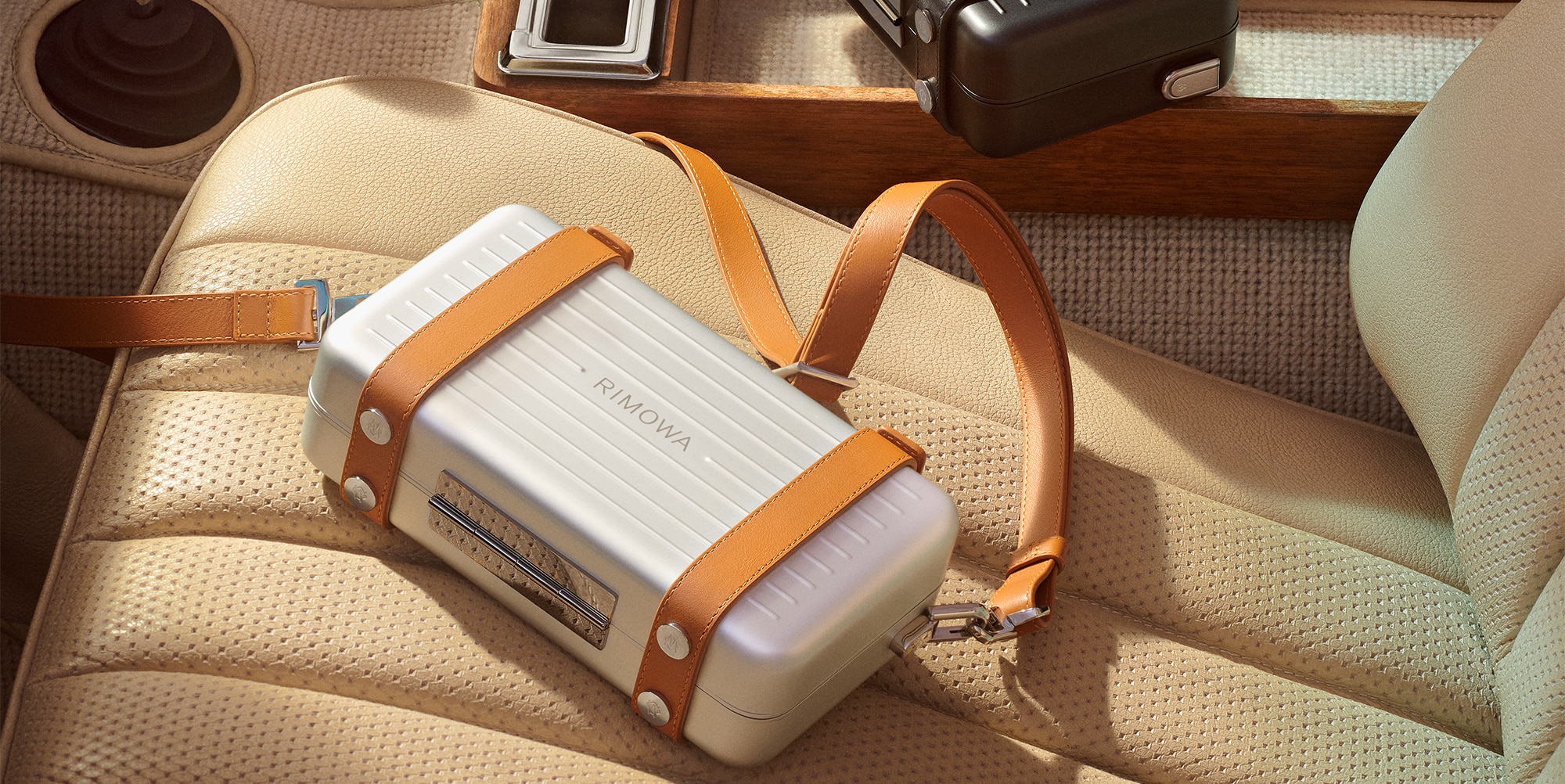 Fashion: Why We Can't Get Enough Of RIMOWA's Mini Suitcases, The Journal