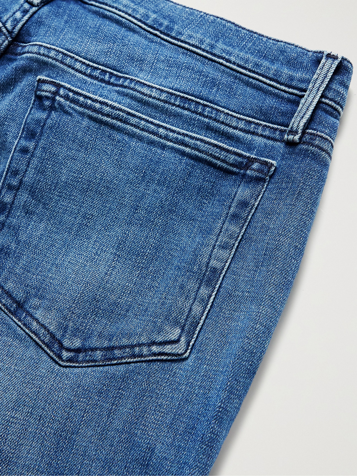 Shop Frame L'homme Skinny-fit Stretch-denim Jeans In Blue