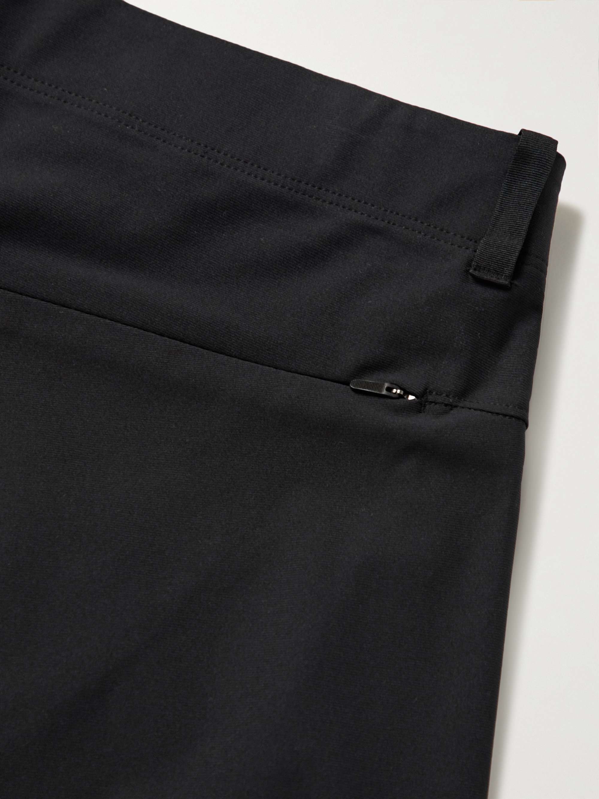 REIGNING CHAMP Coach's Tapered Primeflex Trousers for Men | MR PORTER