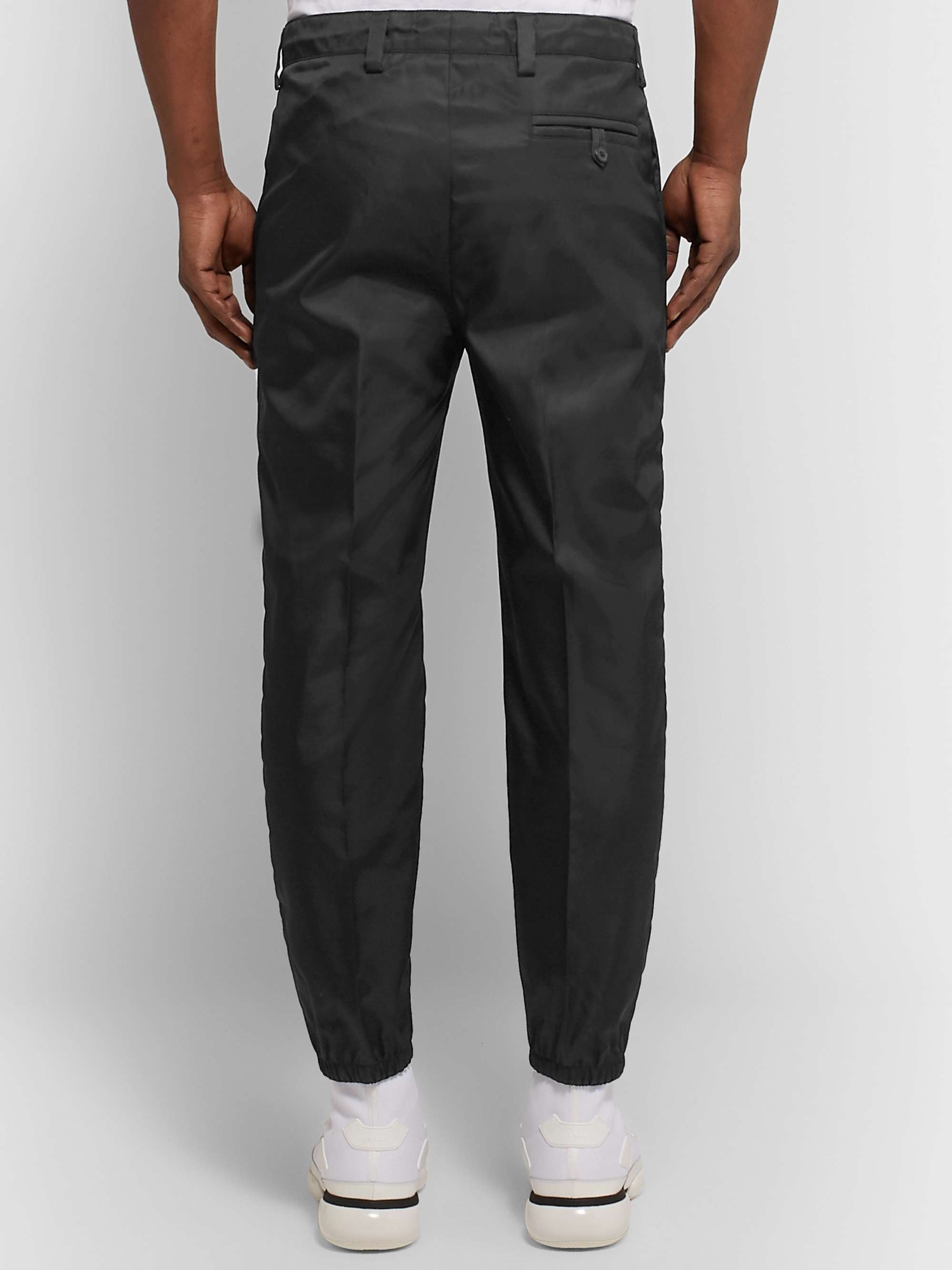 PRADA Black Slim-Fit Tapered Logo-Appliquéd Nylon Trousers