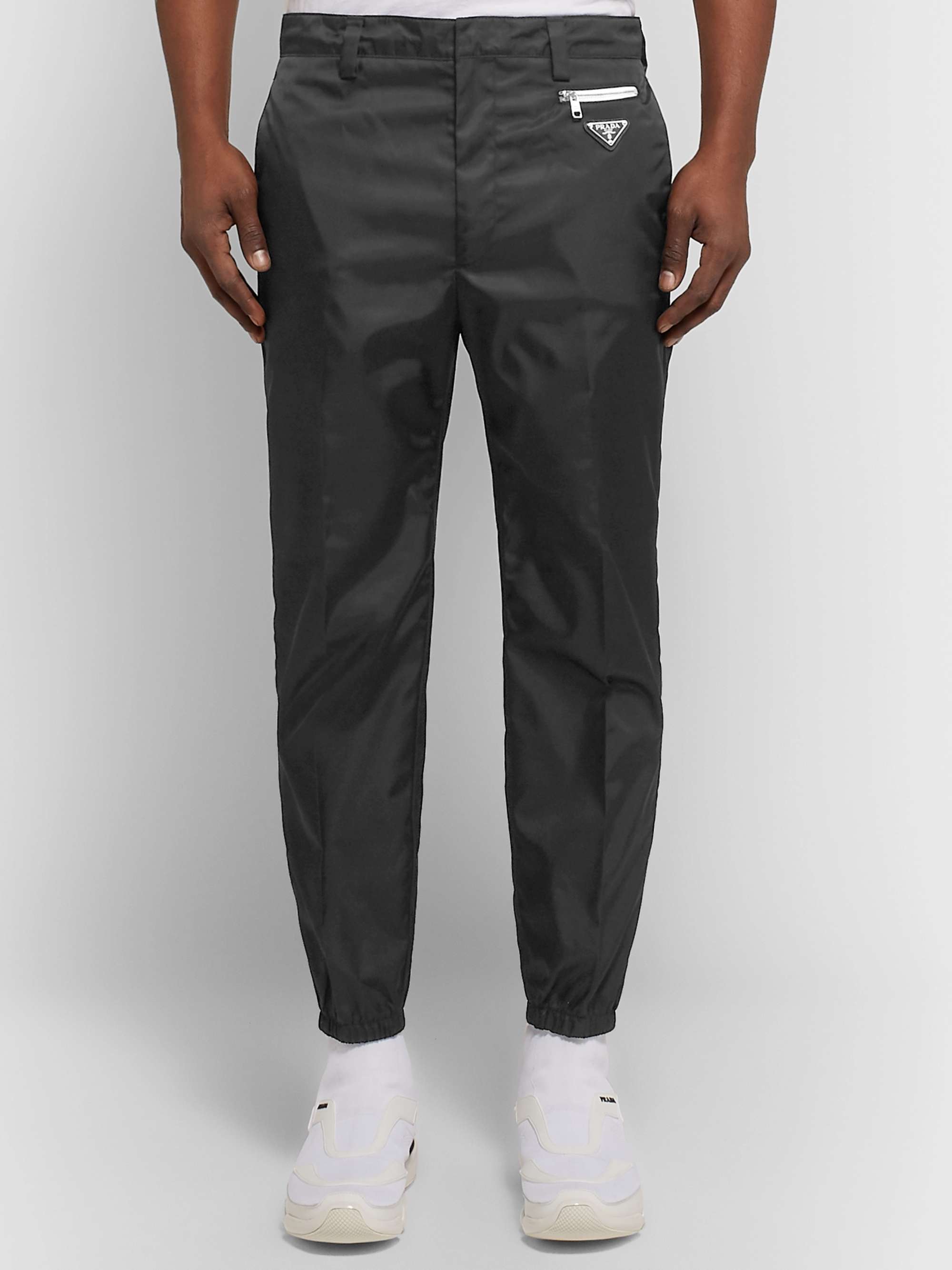 PRADA Black Slim-Fit Tapered Logo-Appliquéd Nylon Trousers