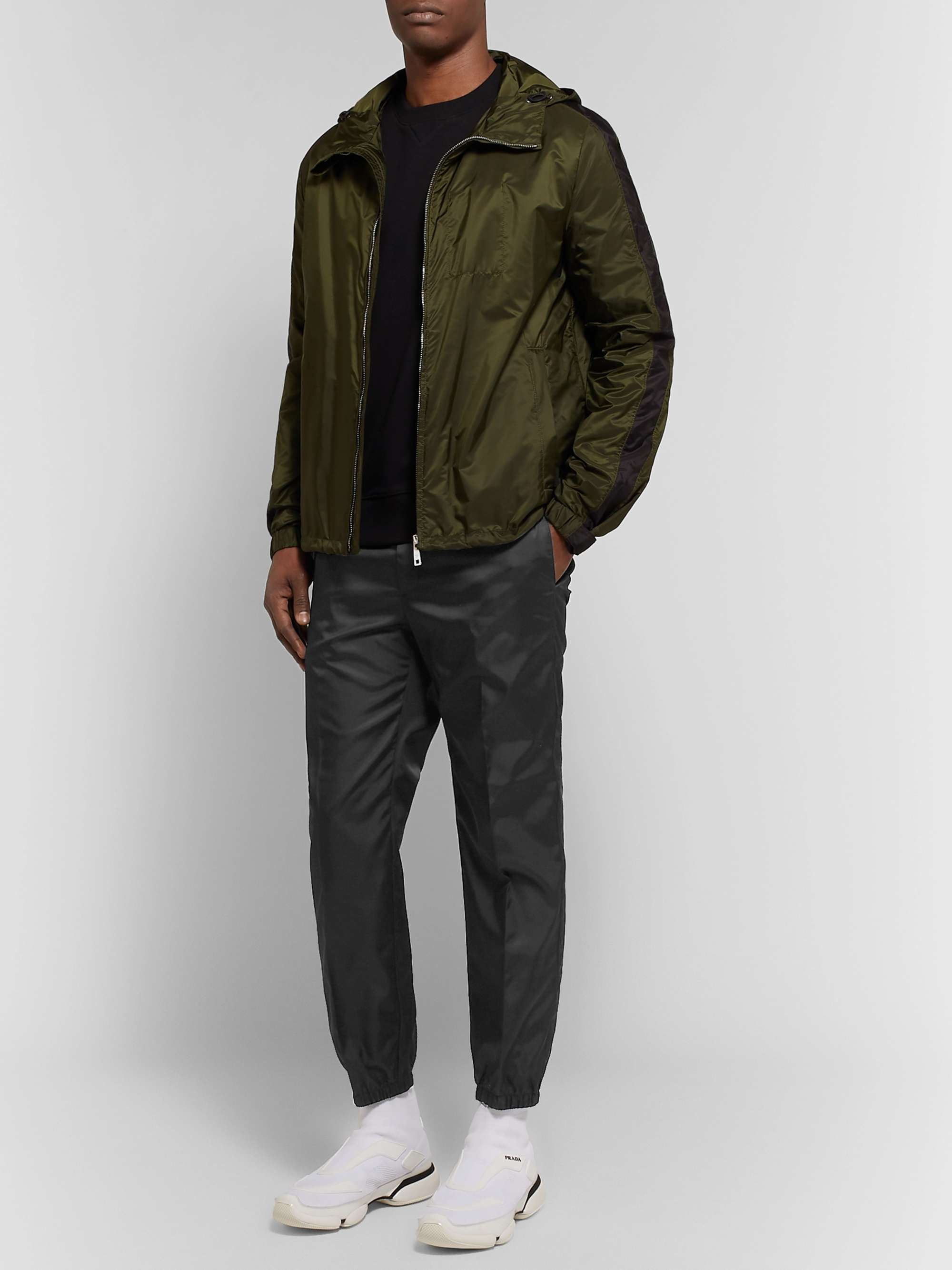 PRADA Black Slim-Fit Tapered Logo-Appliquéd Nylon Trousers