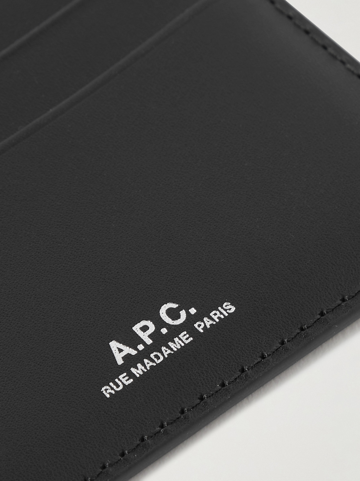 Shop Apc Logo-debossed Leather Cardholder In Black
