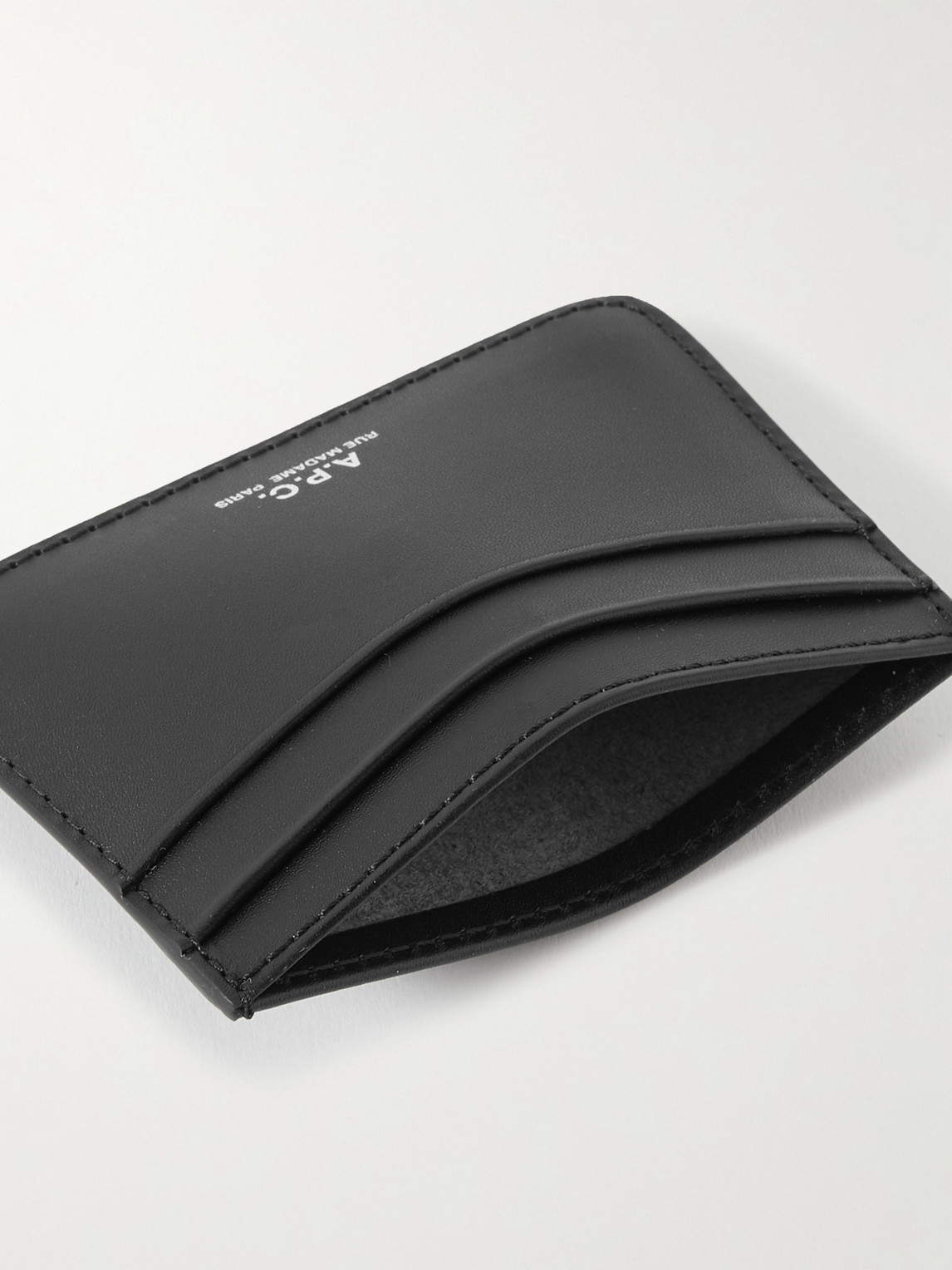 Shop Apc Logo-debossed Leather Cardholder In Black