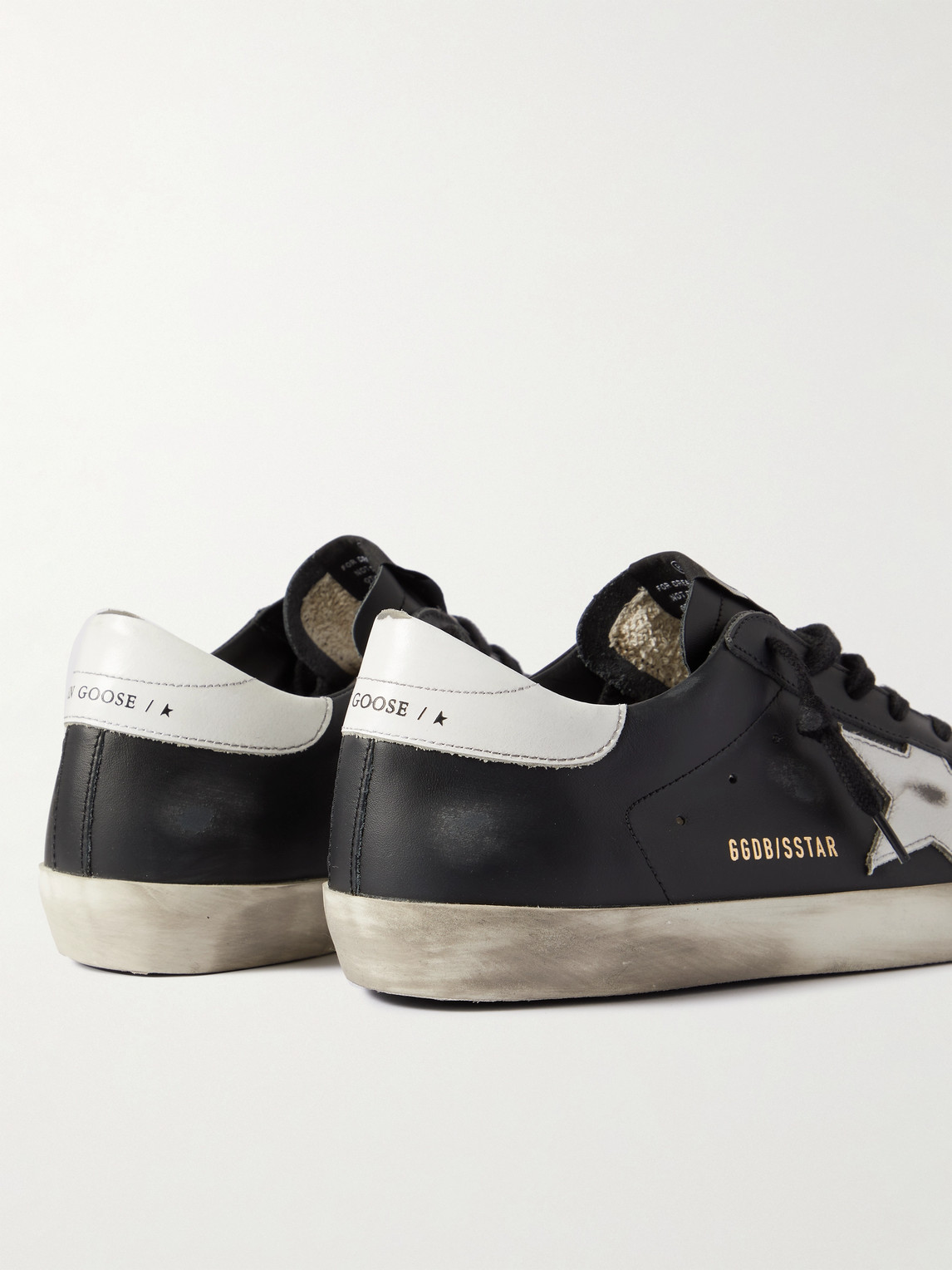 Golden Goose 'super-star' Black Low Top Sneakers With Logo Patch And Suede Details In Leather Man In Black