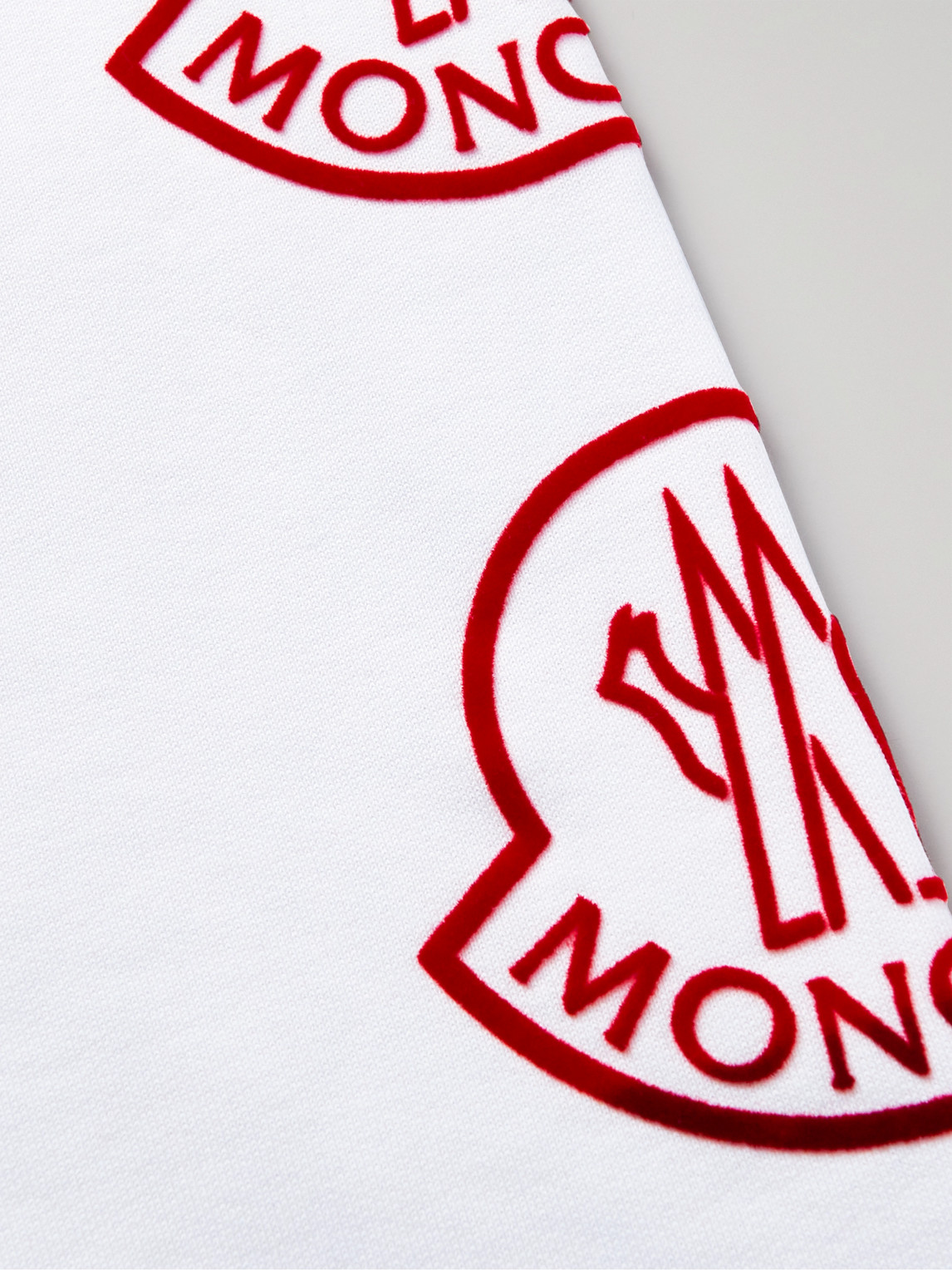 Shop Moncler Tapered Logo-print Cotton-jersey Sweatpants In White