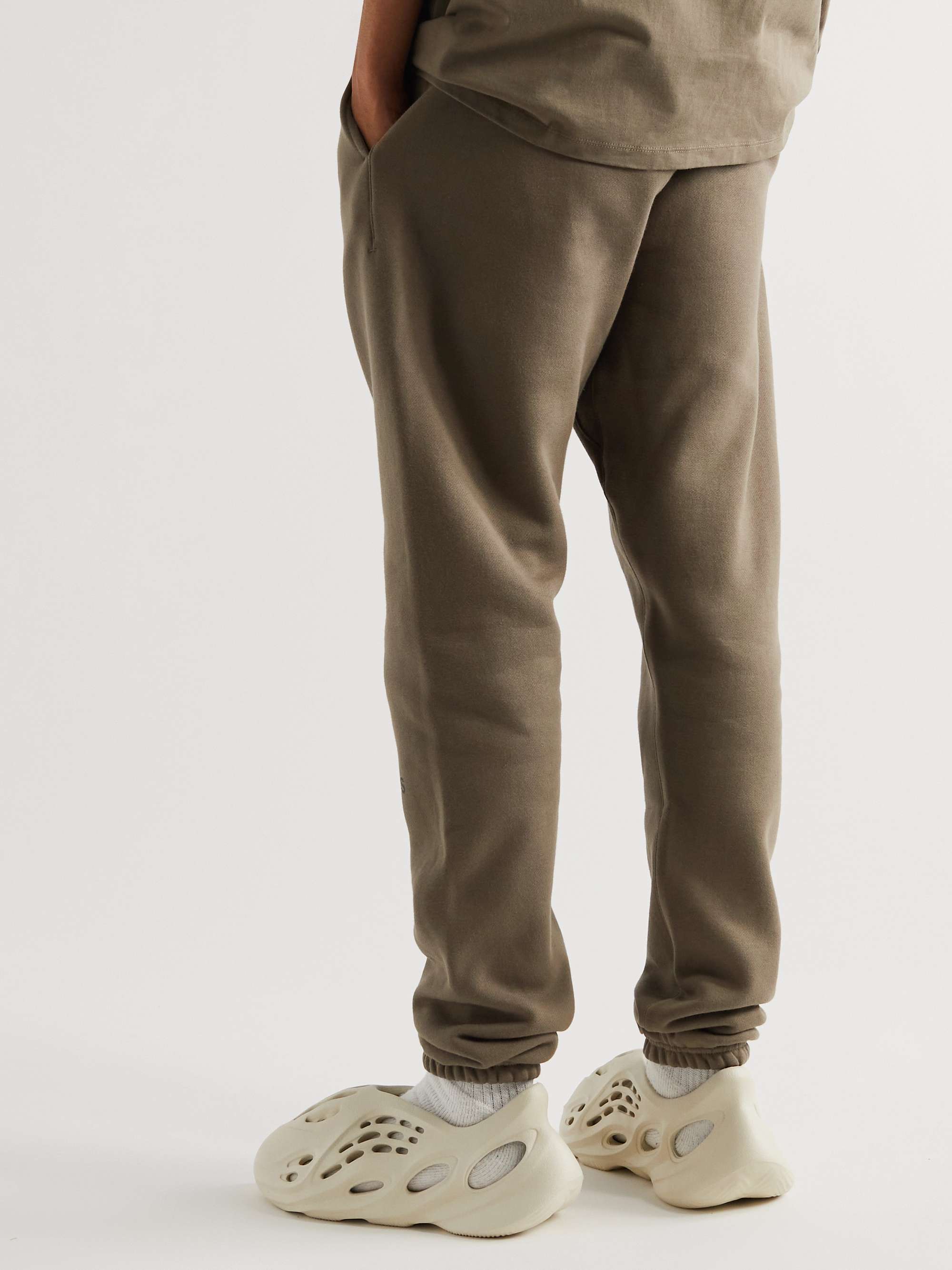 FEAR OF GOD ESSENTIALS Tapered Logo-Print Cotton-Blend Jersey Sweatpants