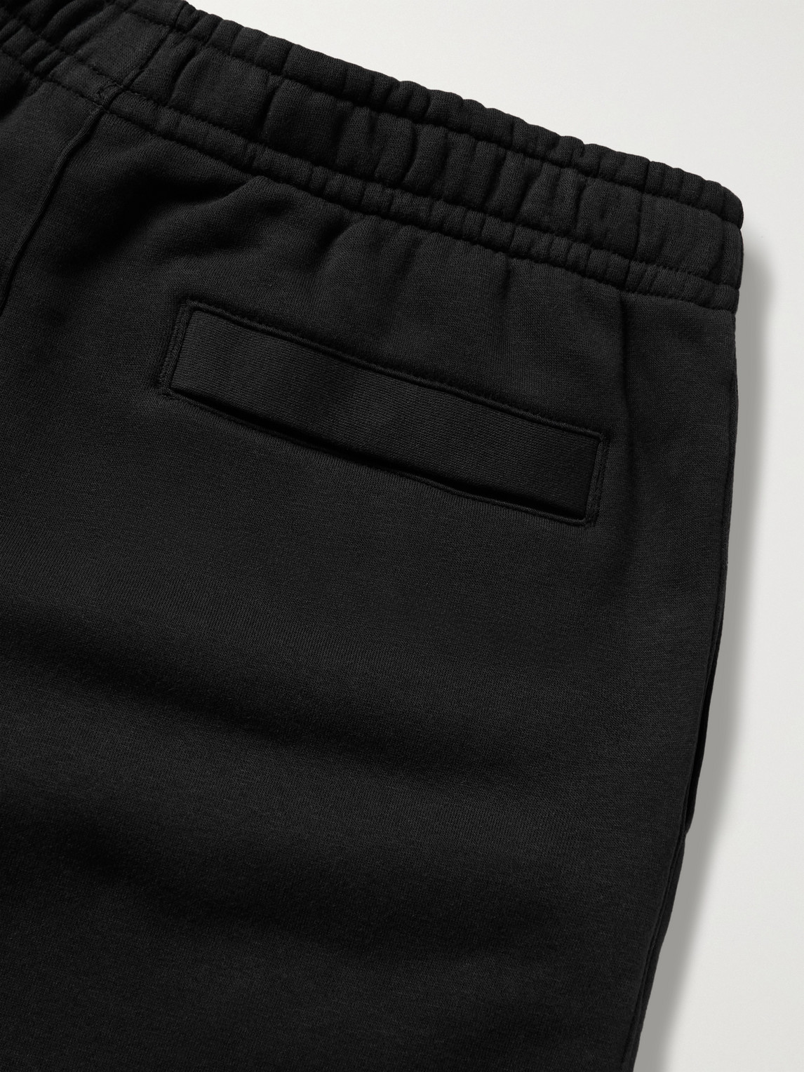 Shop Nike Sportswear Club Tapered Cotton-blend Jersey Sweatpants In Black