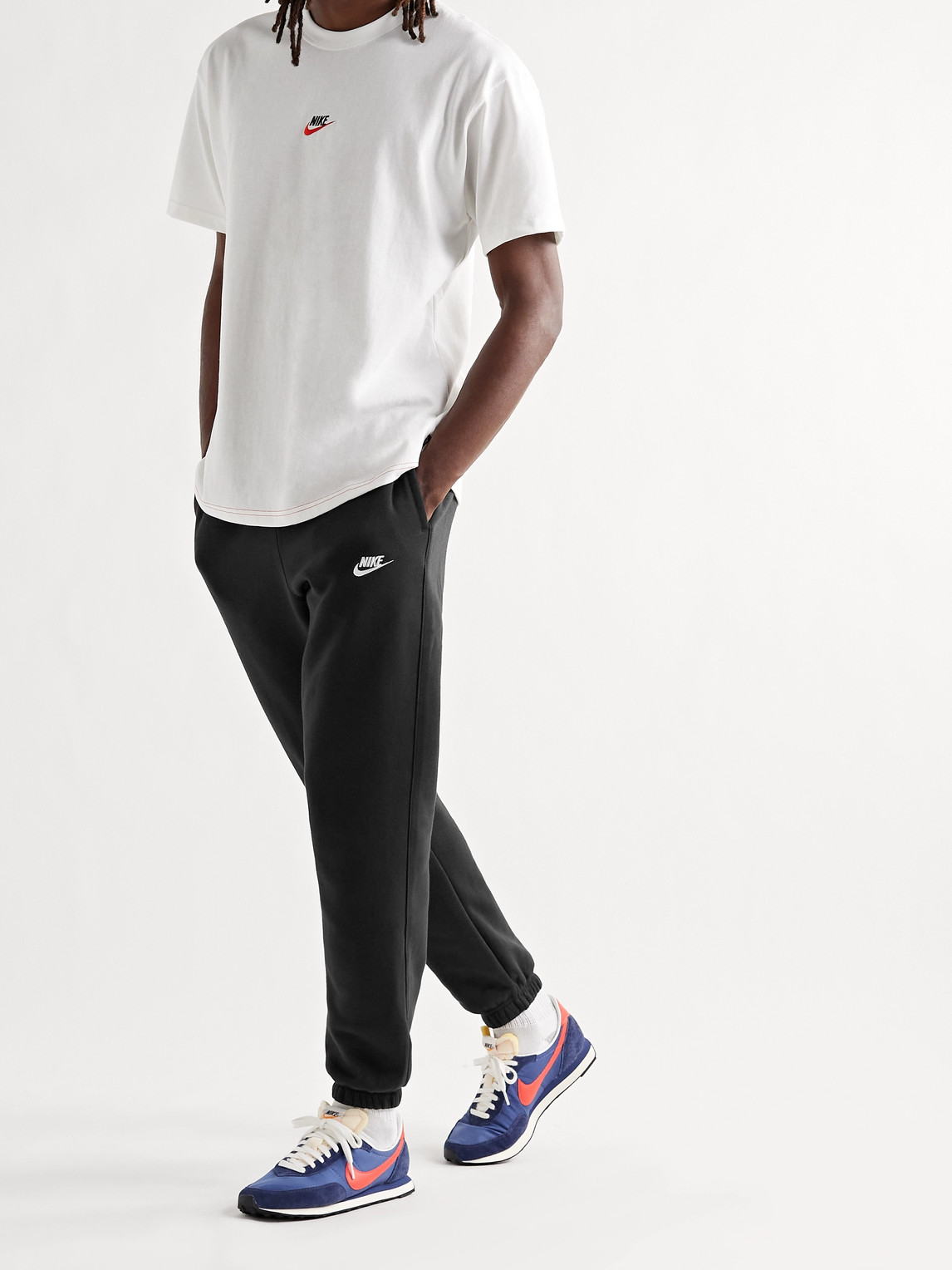 Shop Nike Sportswear Club Tapered Cotton-blend Jersey Sweatpants In Black