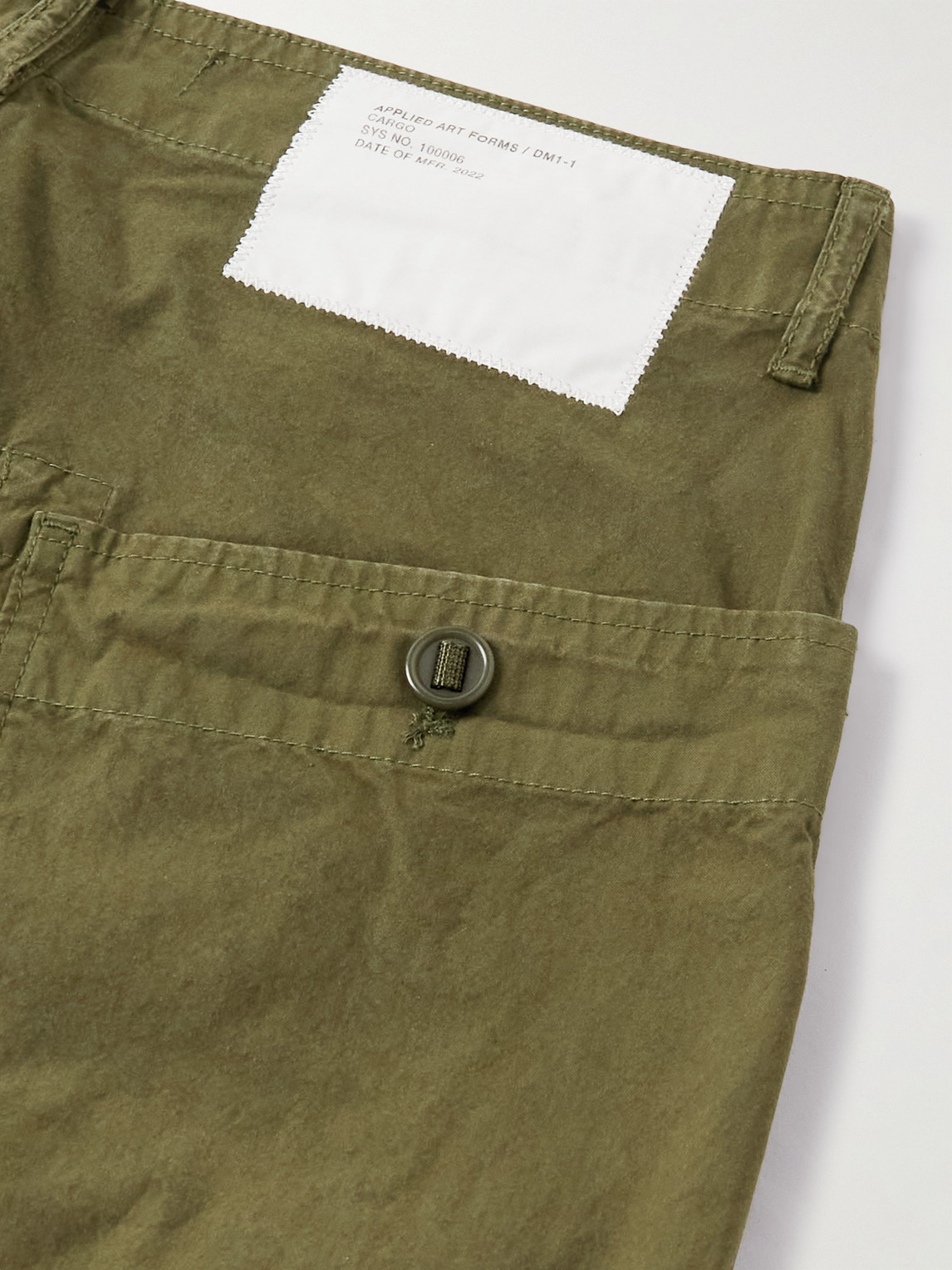 Shop Applied Art Forms Dm1-1 Tapered Pleated Cotton And Cordura-blend Trousers In Green