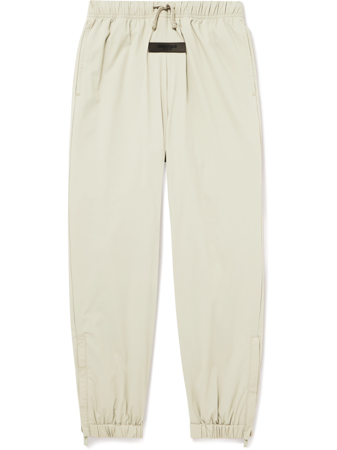 ESSENTIALS TAPERED LOGO-APPLIQUÉD STRETCH-SHELL TRACK PANTS