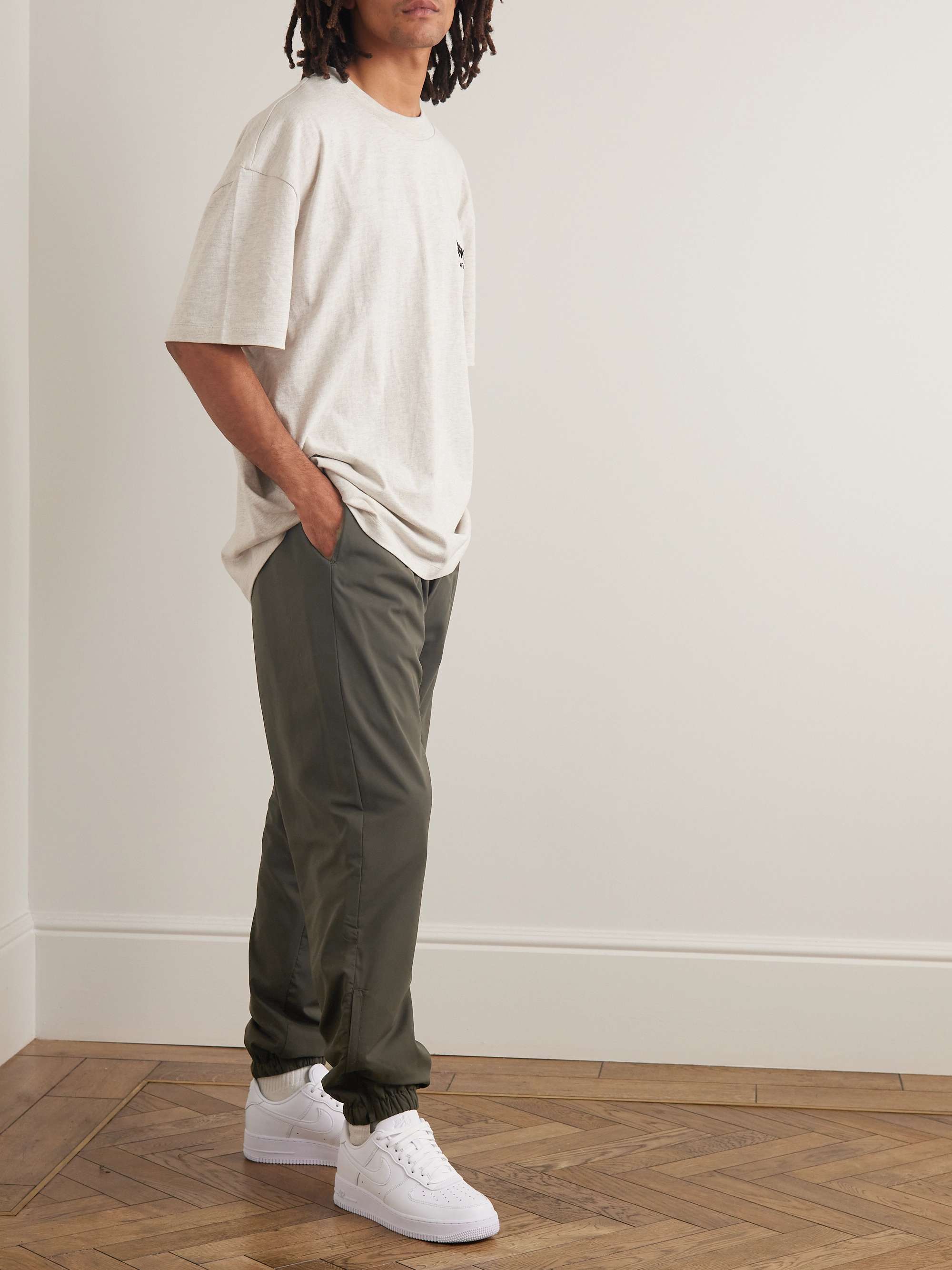 Tapered Logo-Appliquéd Padded Shell Drawstring Trousers