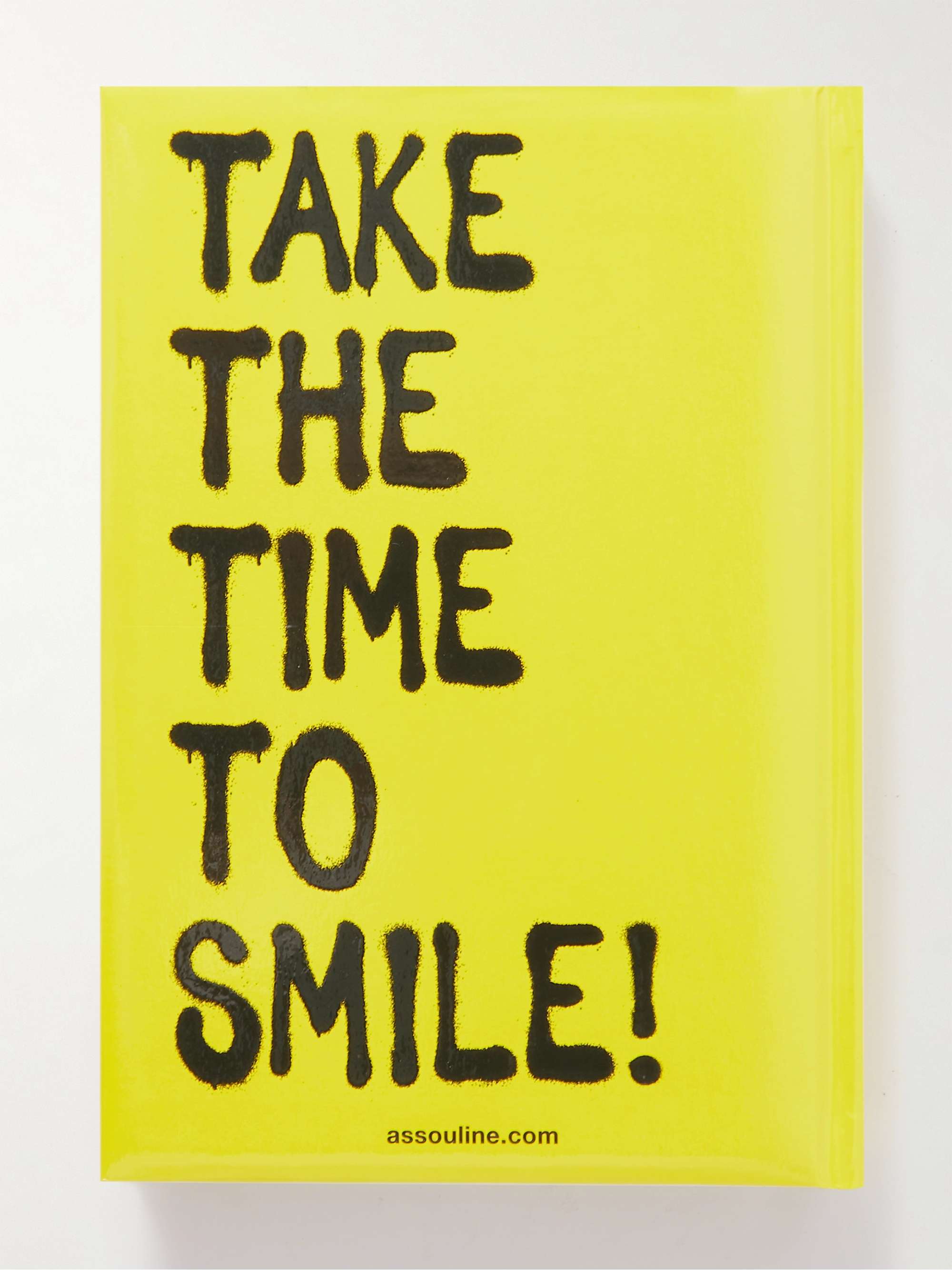 ASSOULINE Smiley: 50 Years of Good News Hardcover Book