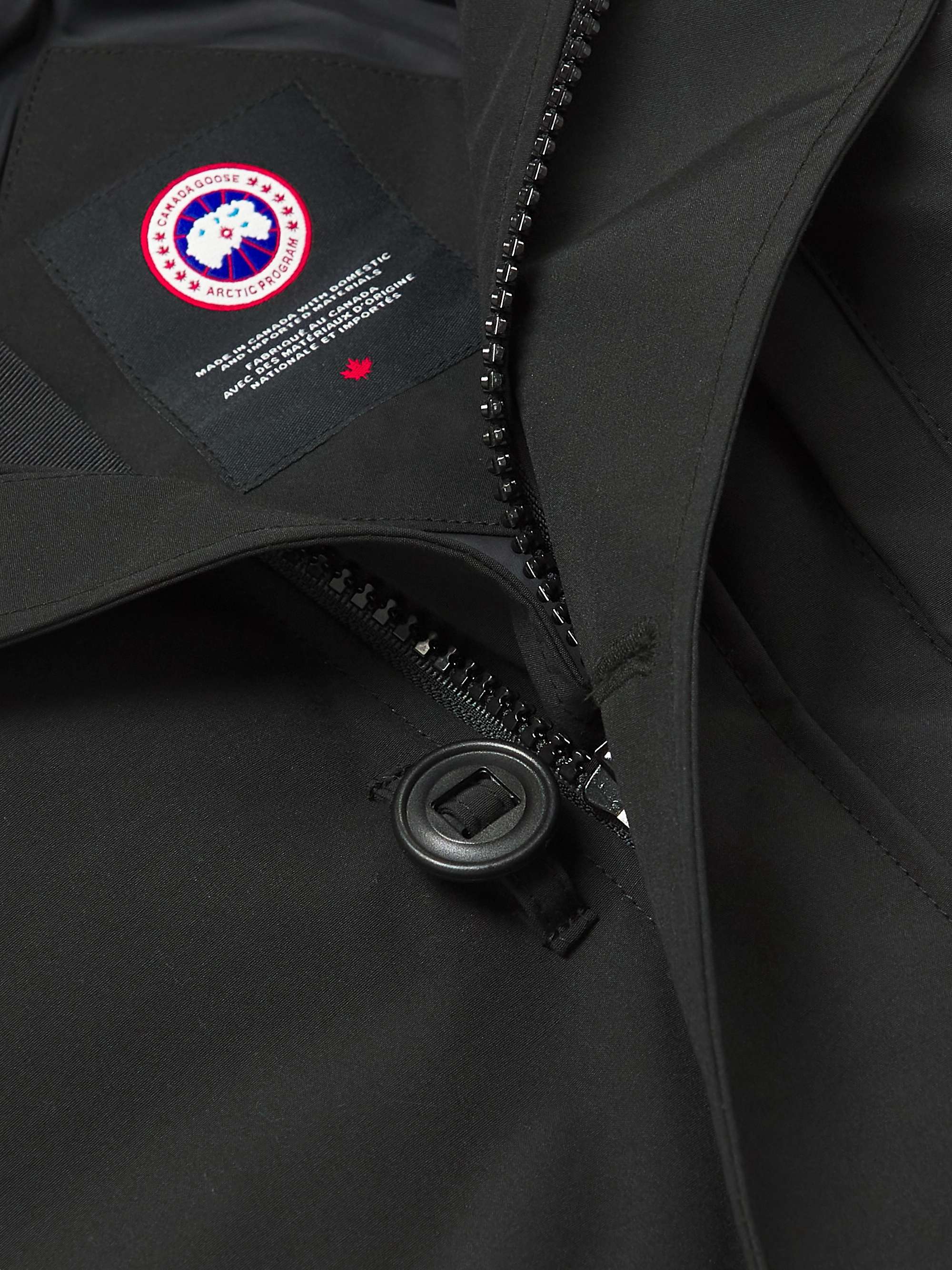 CANADA GOOSE معطف باركا Chateau بقبعة من قماش ®ARCTIC TECH العازل ومحشو بالزغب ومزين برقعة شعار العلامة