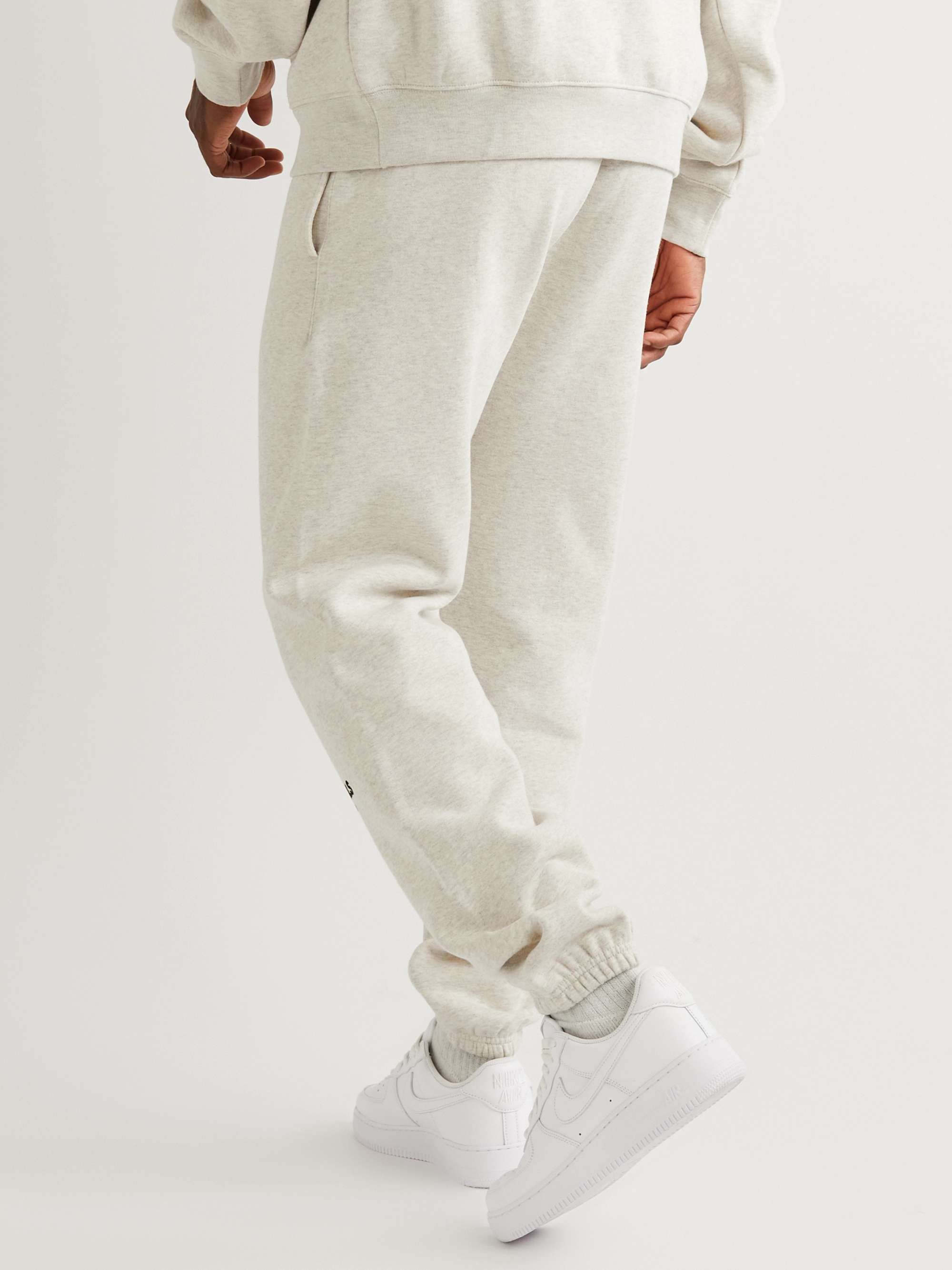 FEAR OF GOD ESSENTIALS Tapered Logo-Flocked Cotton-Blend Jersey Sweatpants