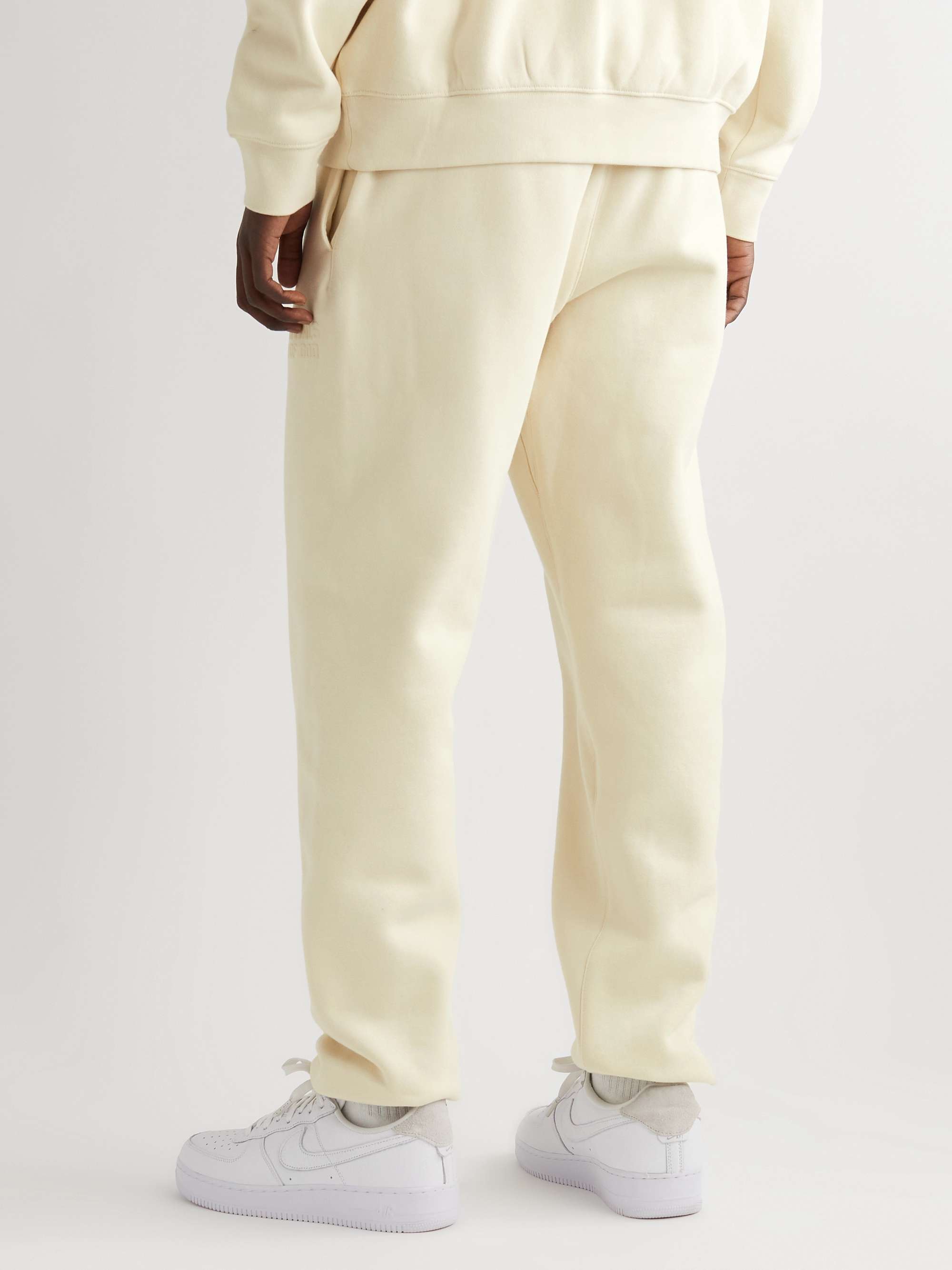 FEAR OF GOD ESSENTIALS Slim-Fit Tapered Logo-Flocked Cotton-Blend Jersey Sweatpants