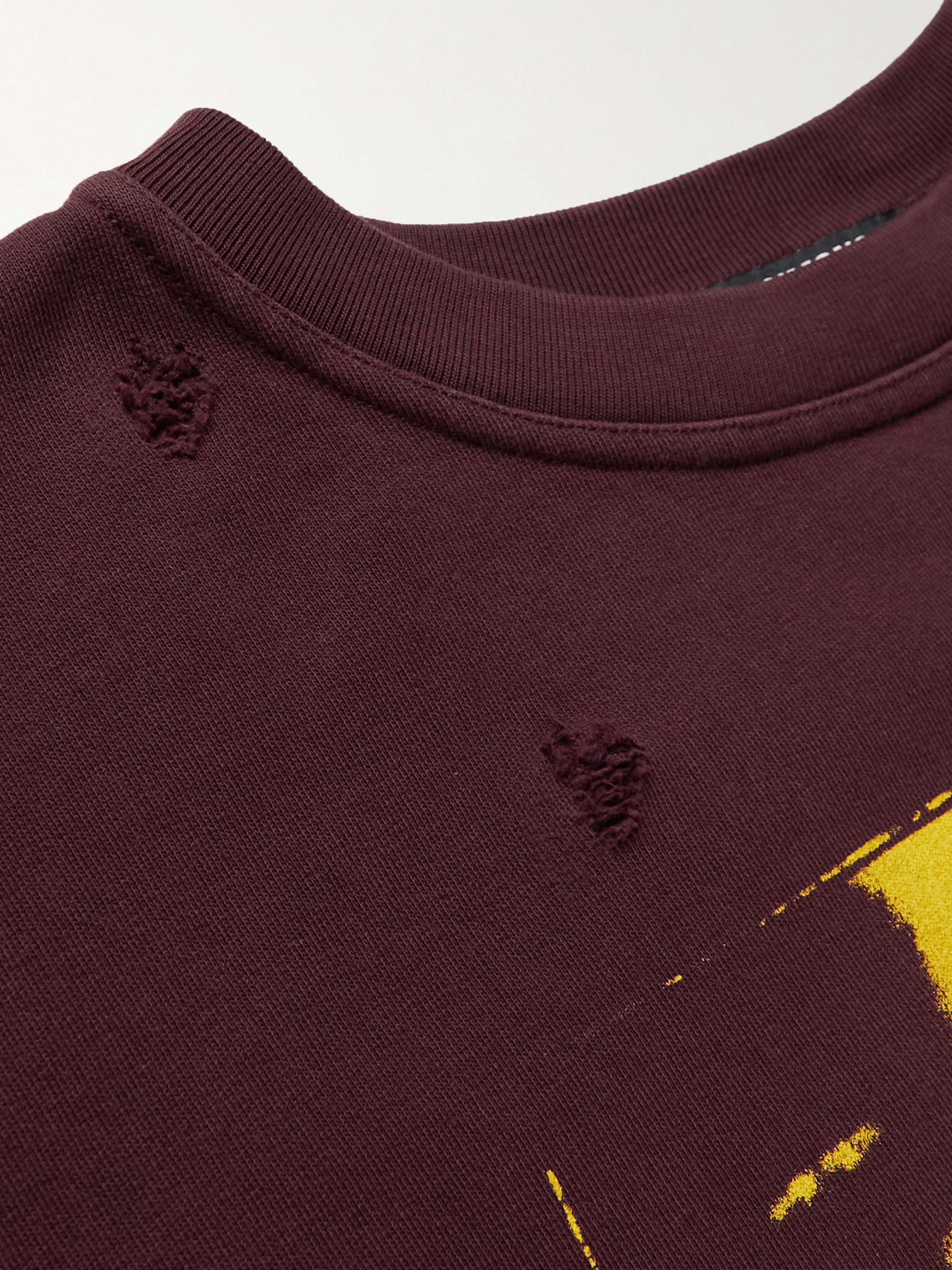 RAF SIMONS سويت شيرت فضفاض بتأثير معتّق من قطن الجيرسي بطبعات