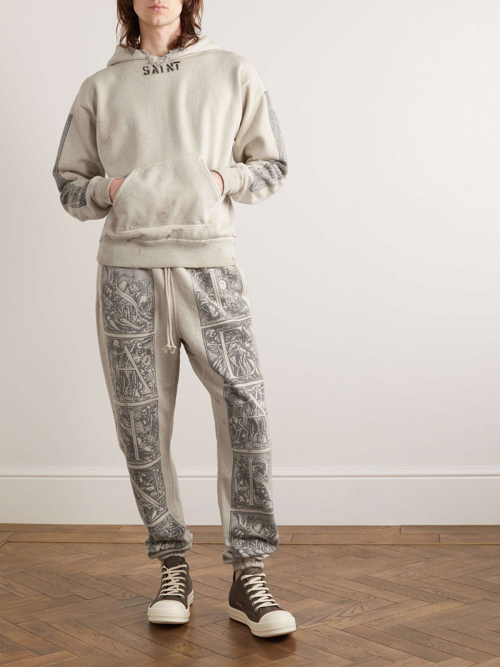 + Denim Tears Tapered Printed Distressed Cotton-Jersey Sweatpants
