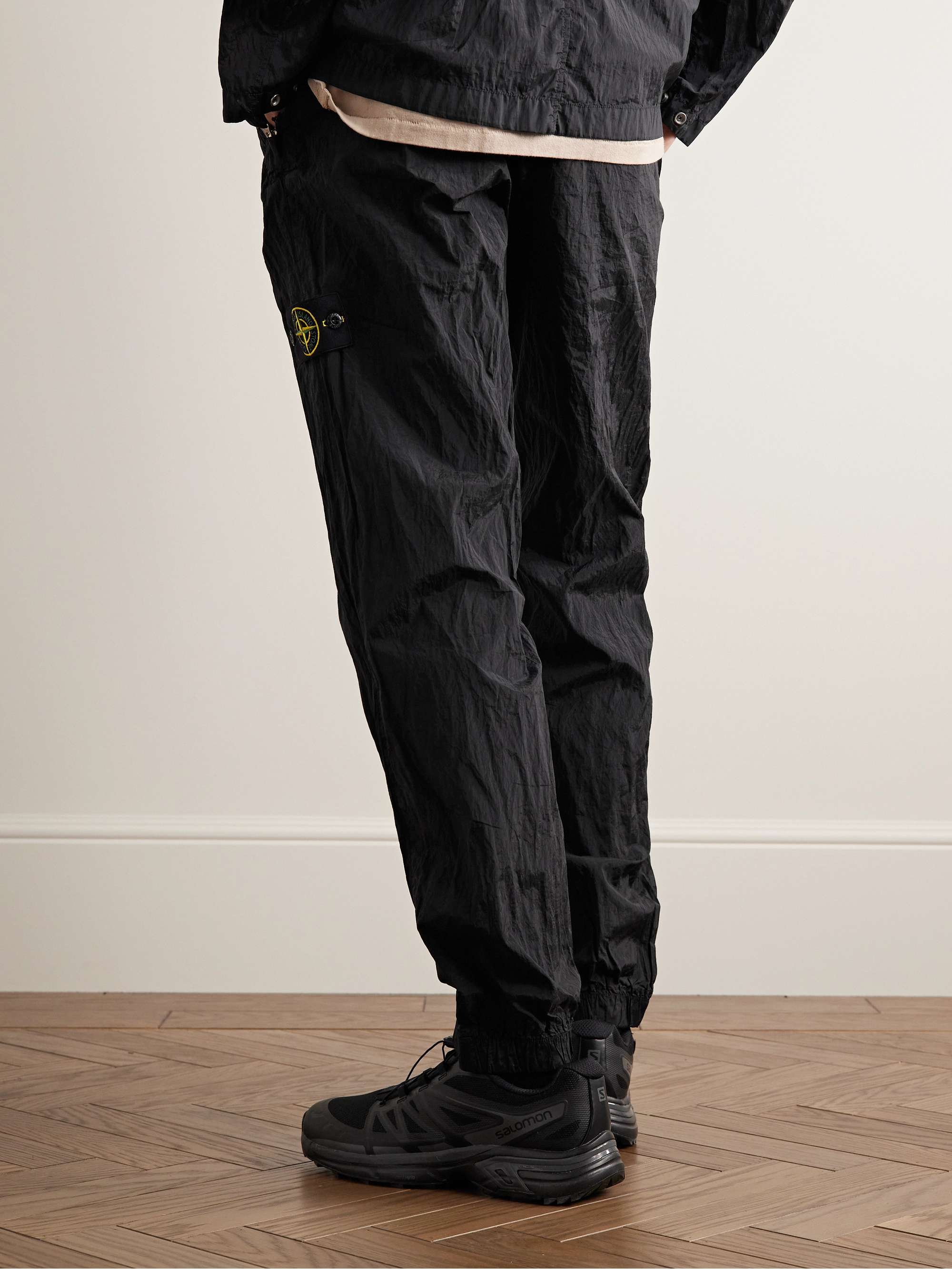 STONE ISLAND Slim-Fit Tapered Logo-Appliquéd Metallic Shell Trousers