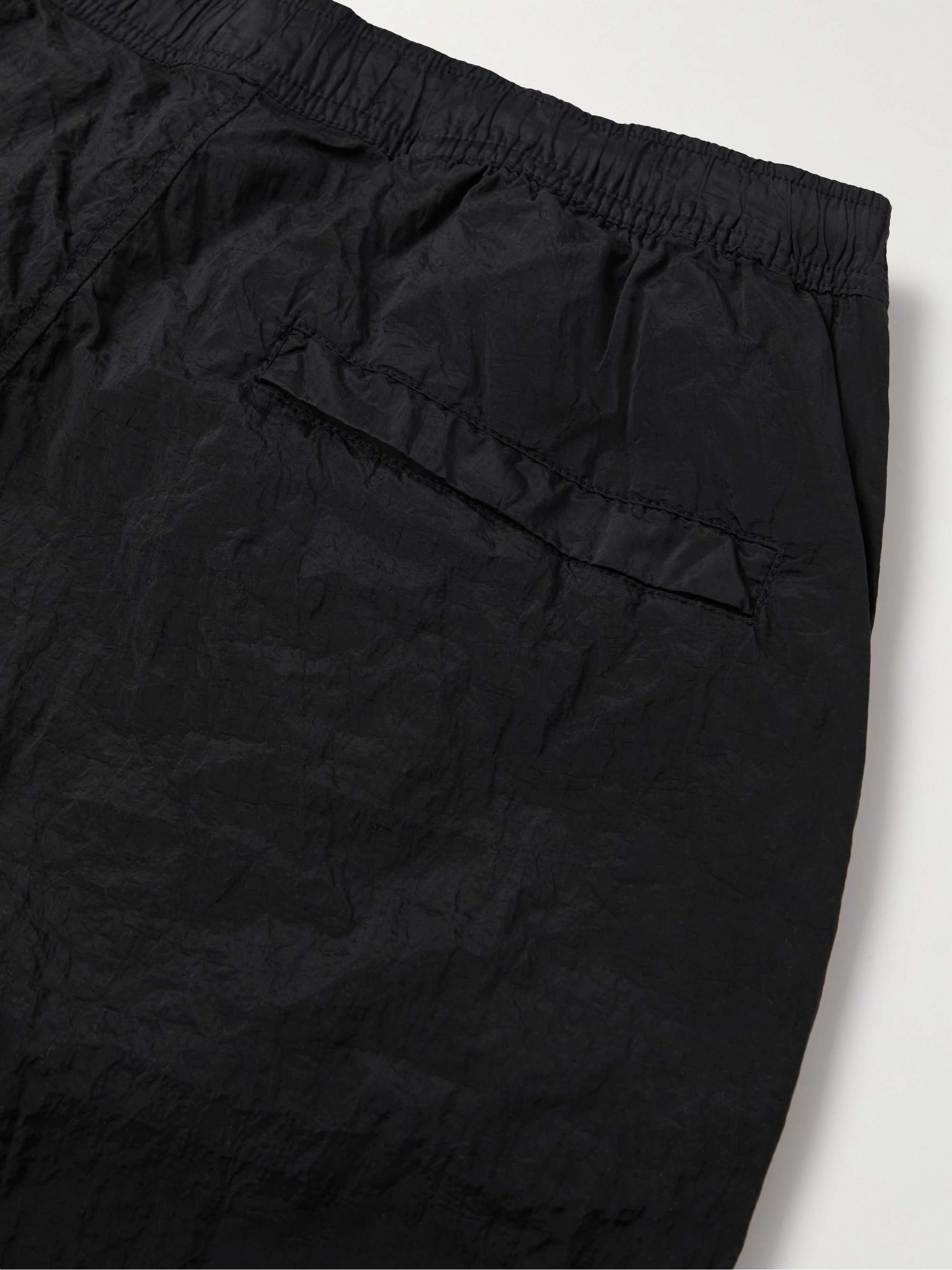 STONE ISLAND Slim-Fit Tapered Logo-Appliquéd Metallic Shell Trousers