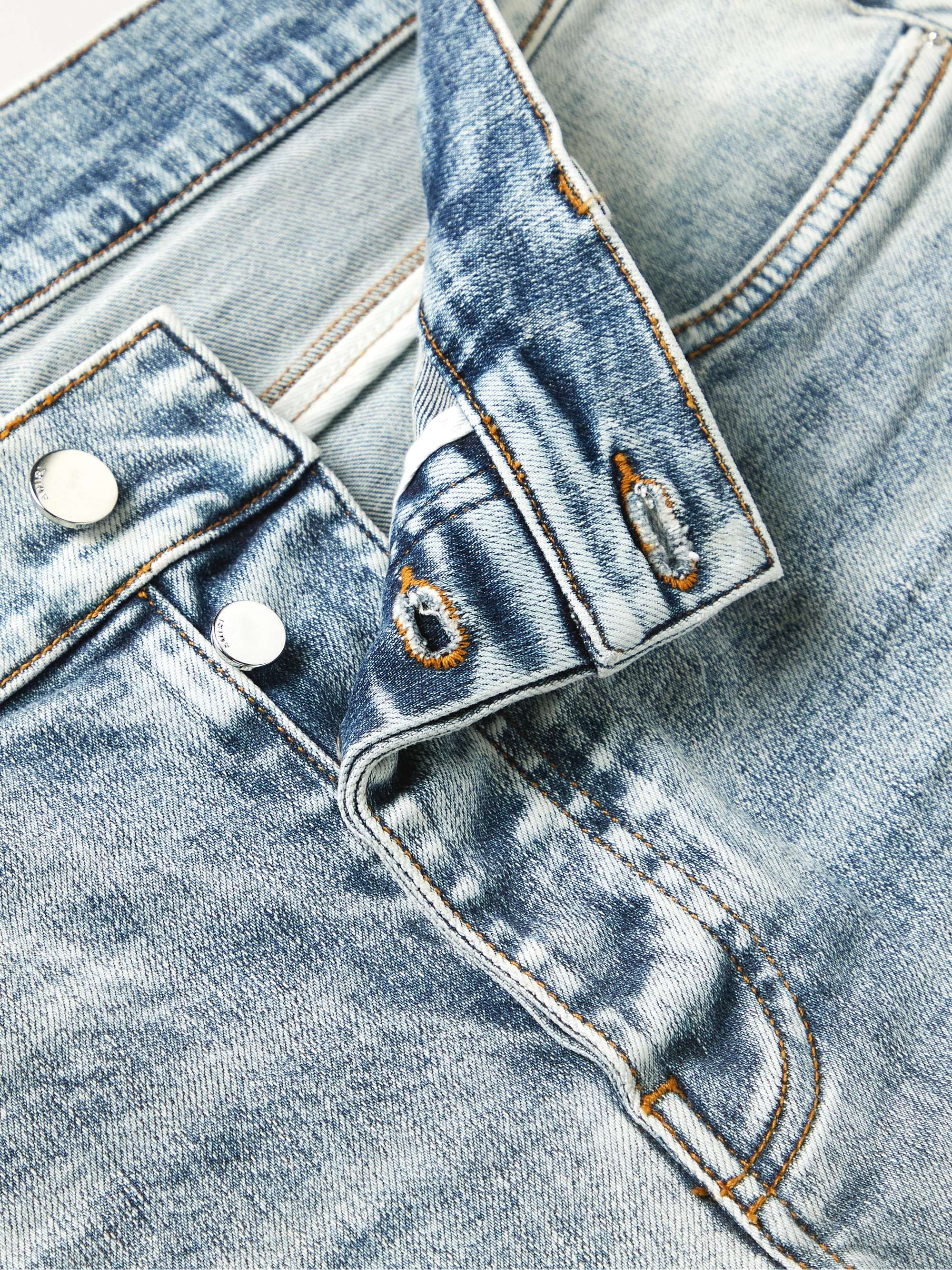 AMIRI Skinny-Fit Logo-Appliquéd Distressed Jeans
