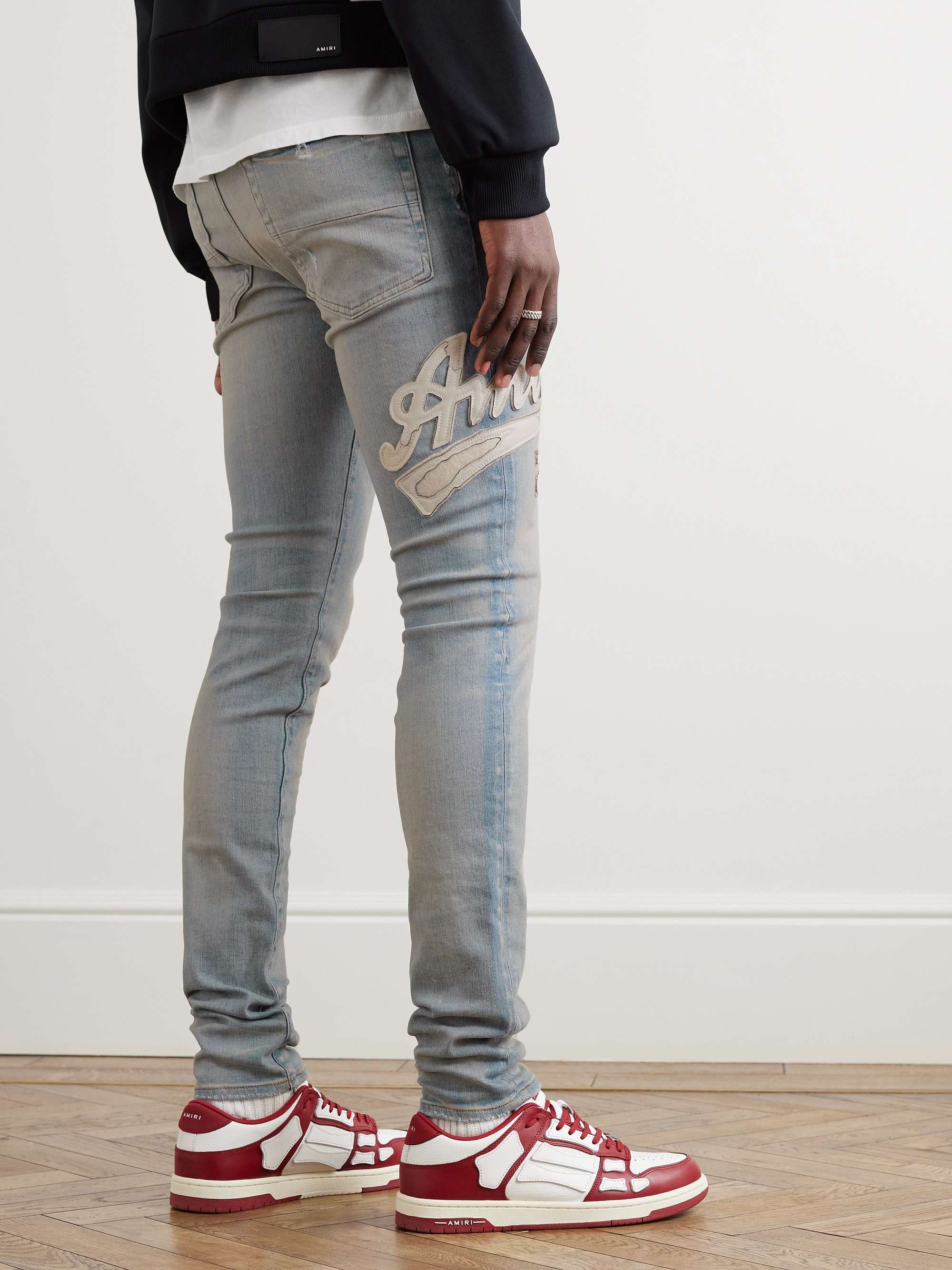 AMIRI Varsity Skinny-Fit Leather-Appliquéd Jeans