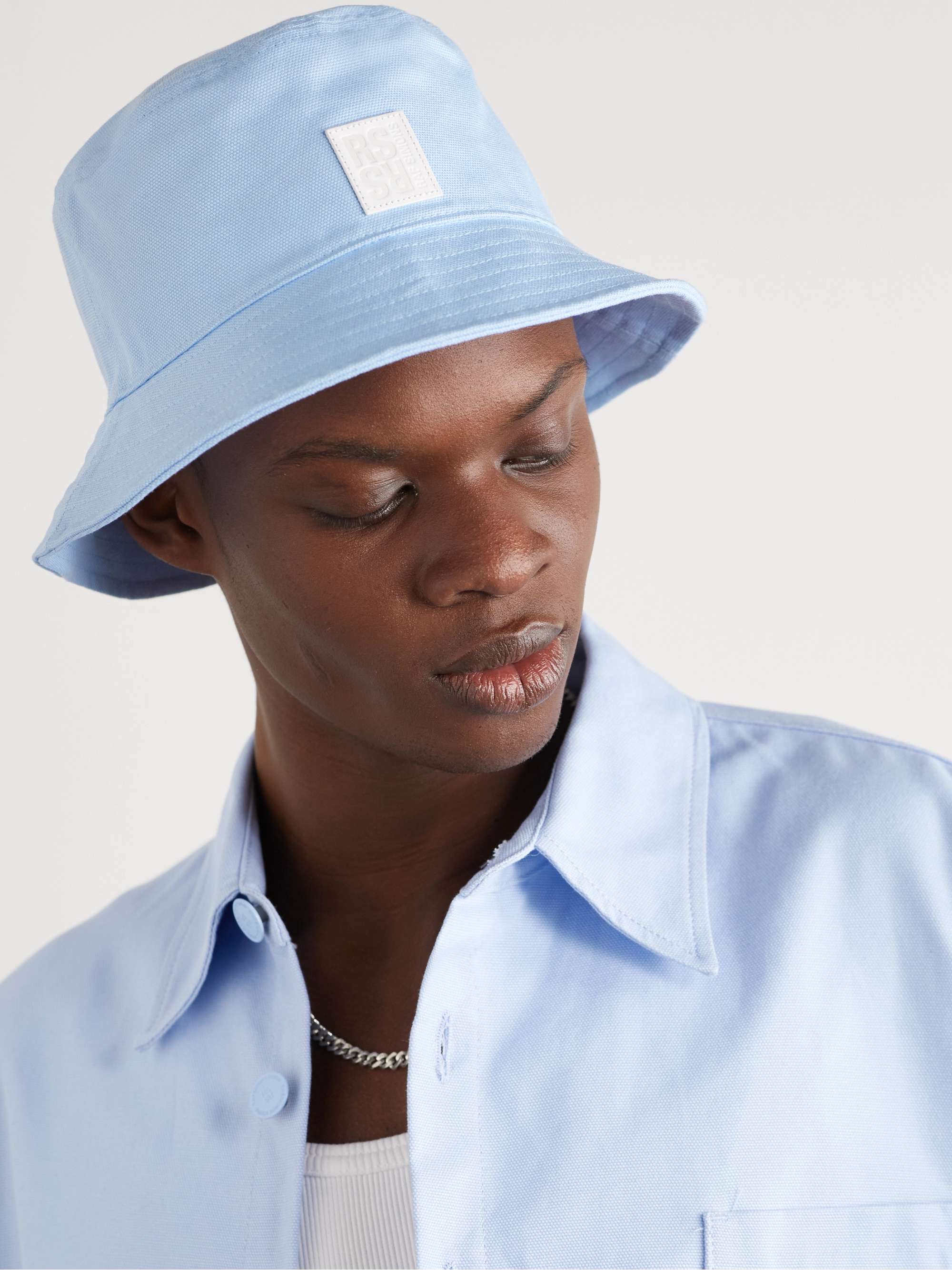 RAF SIMONS Logo-Appliquéd Cotton-Canvas Bucket Hat for Men | MR PORTER