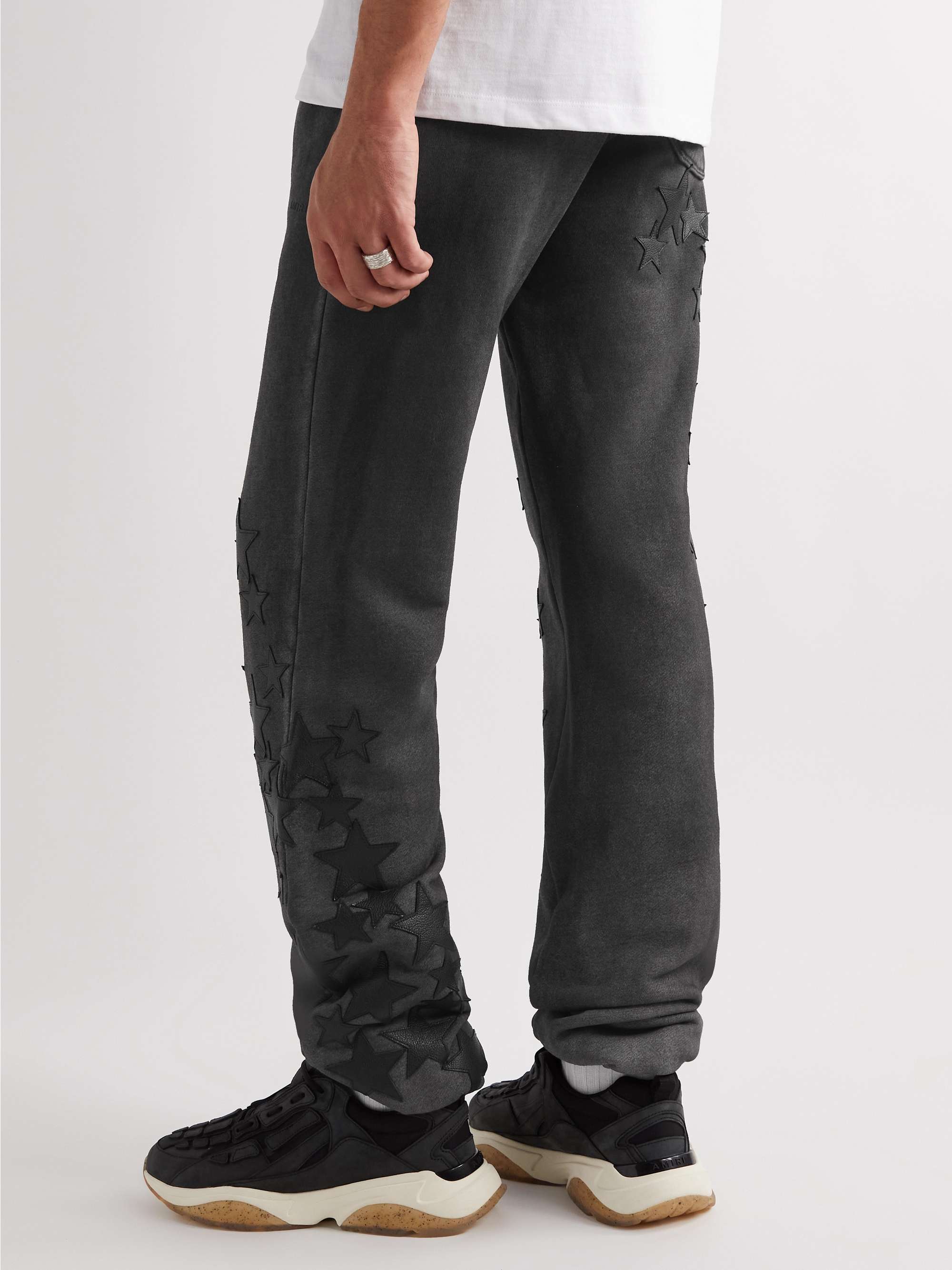 AMIRI Pigment Spray Star Tapered Leather-Trimmed Cotton-Jersey Sweatpants
