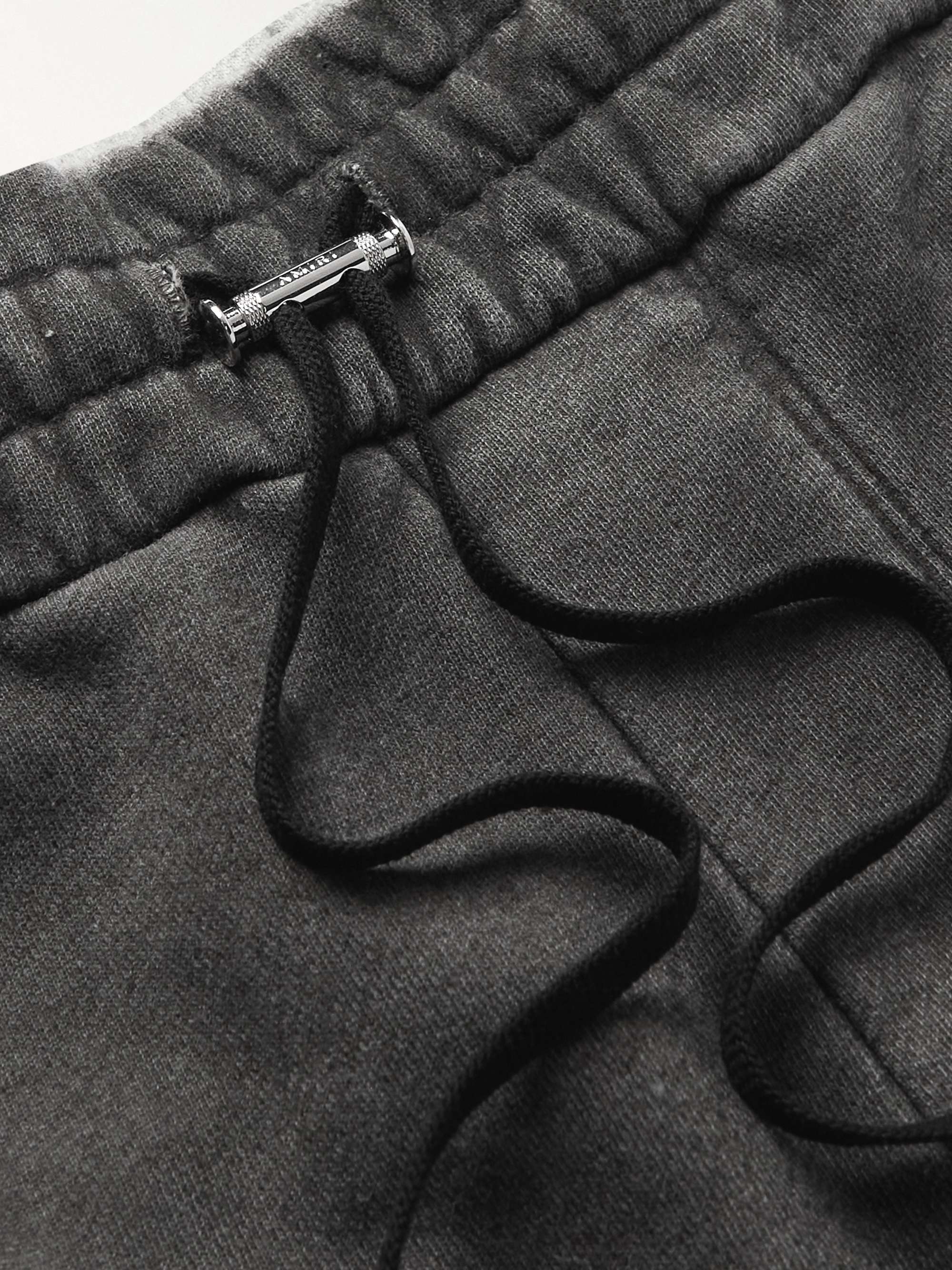 AMIRI Pigment Spray Star Tapered Leather-Trimmed Cotton-Jersey Sweatpants