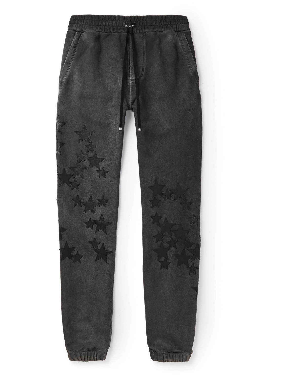 AMIRI PIGMENT SPRAY STAR TAPERED LEATHER-TRIMMED COTTON-JERSEY SWEATtrousers