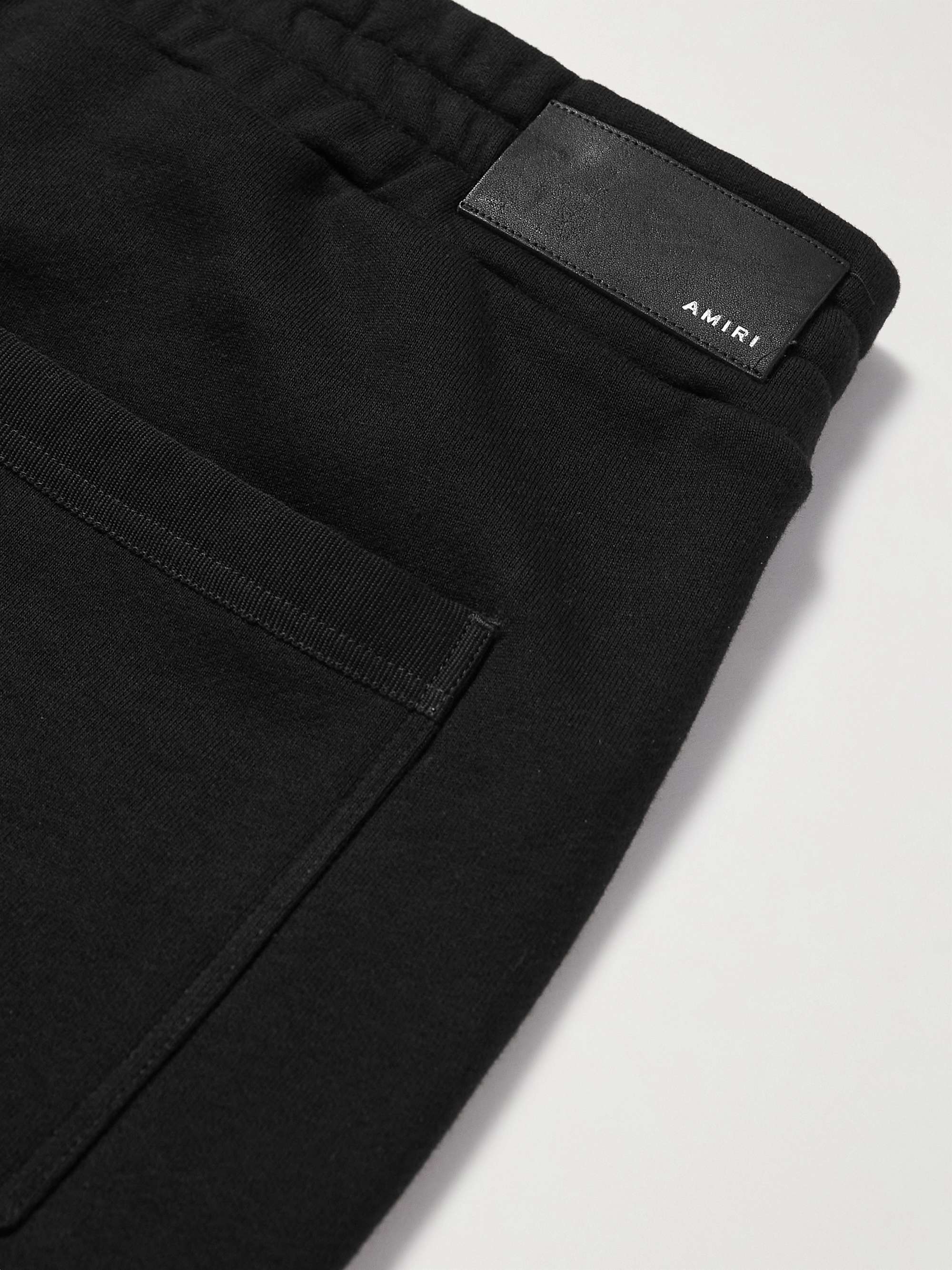 AMIRI Zoltar Tapered Logo-Print Cotton-Jersey Sweatpants