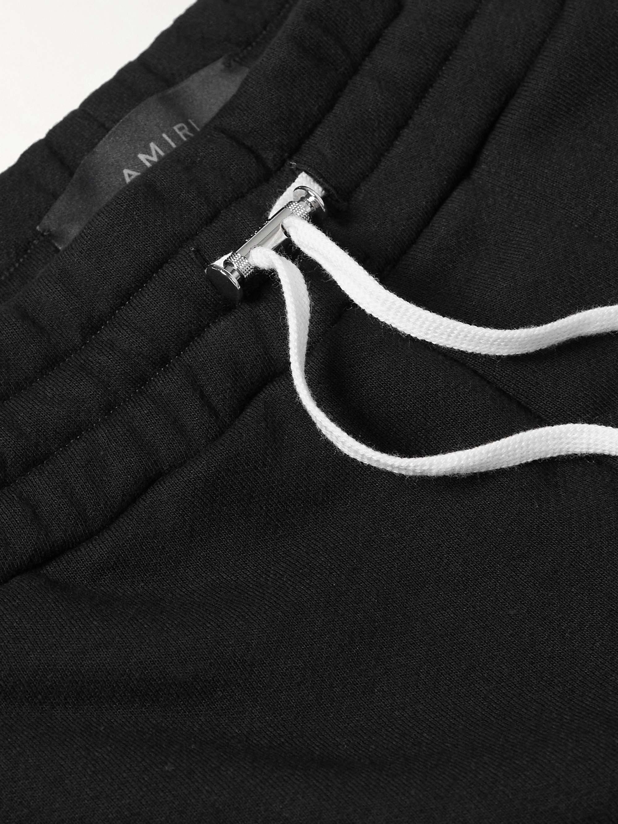 AMIRI Zoltar Tapered Logo-Print Cotton-Jersey Sweatpants