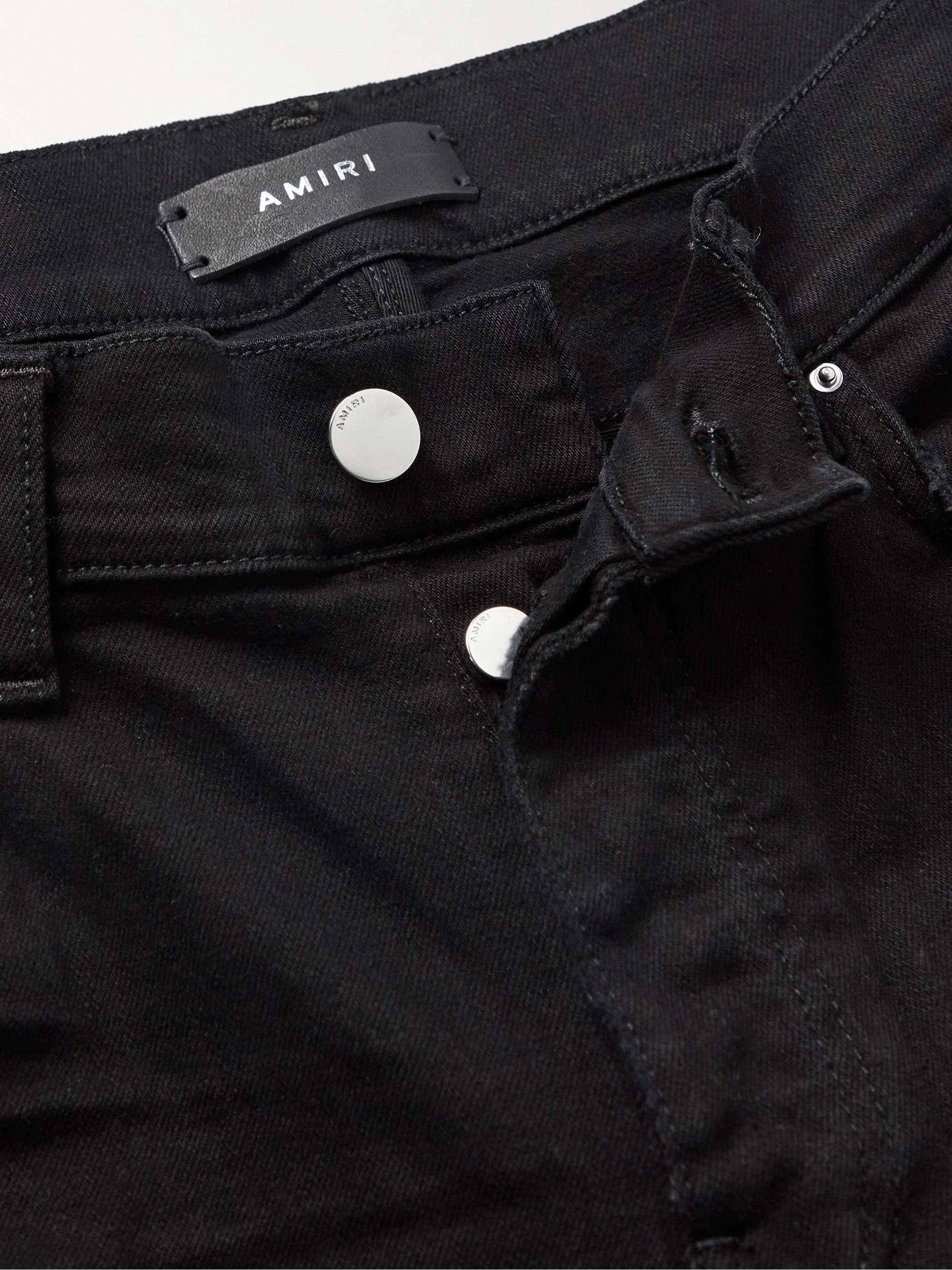 AMIRI Skinny-Fit Logo-Appliquéd Distressed Jeans