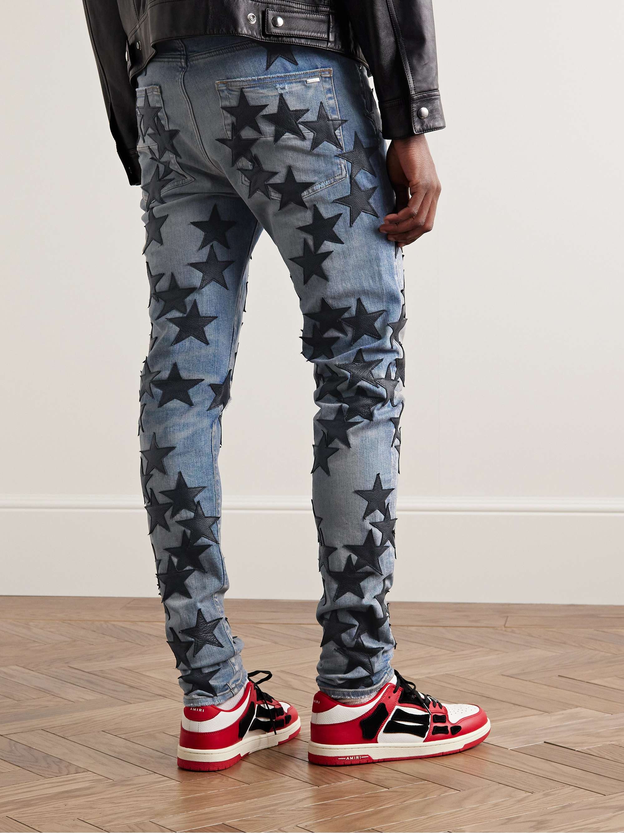 AMIRI + Chemist Jeans skinny effetto invecchiato con applicazioni in pelle