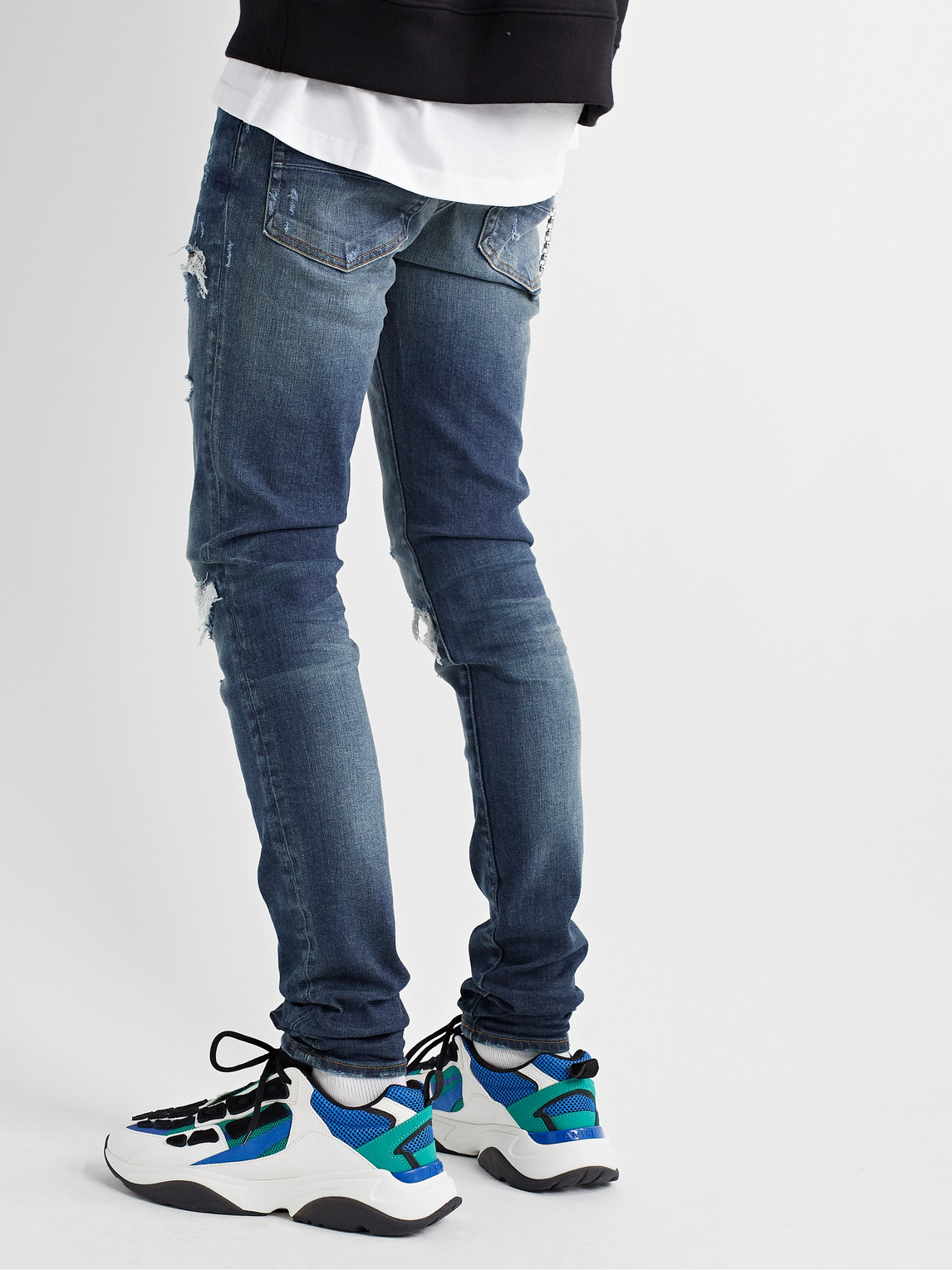 Shop Amiri Mx1 Skinny-fit Panelled Distressed Jeans In Blue