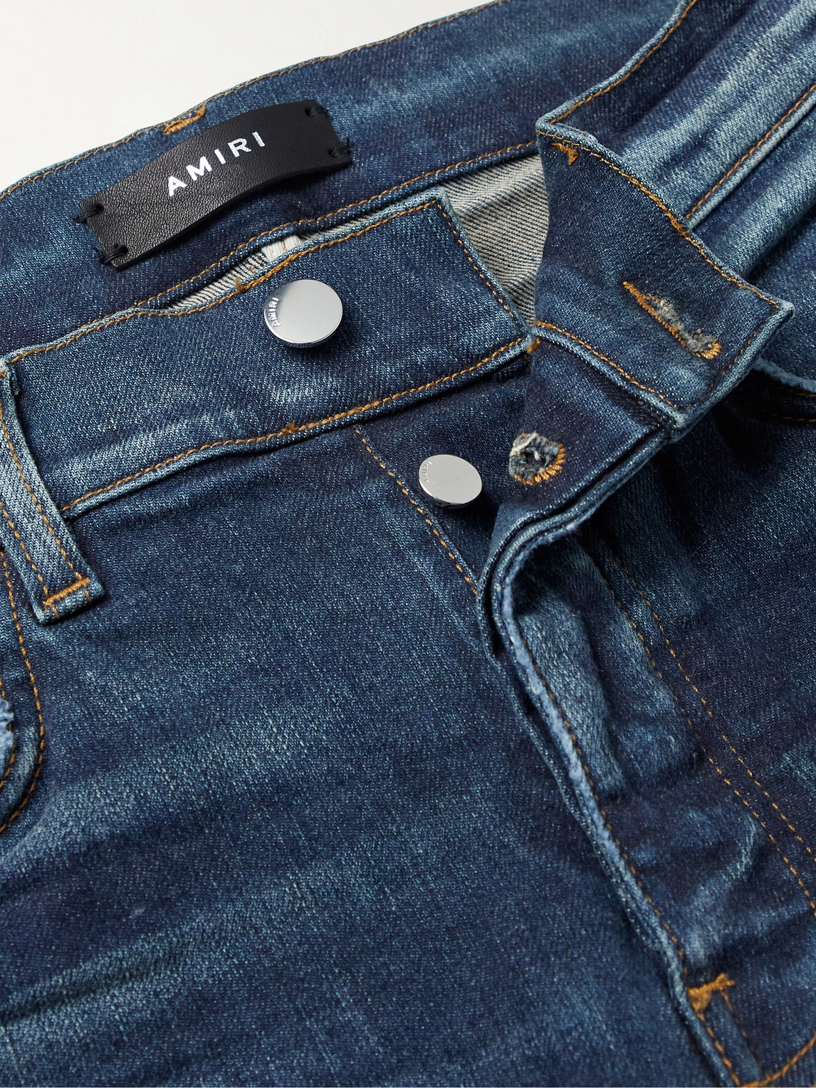 Shop Amiri Mx1 Skinny-fit Panelled Distressed Jeans In Blue