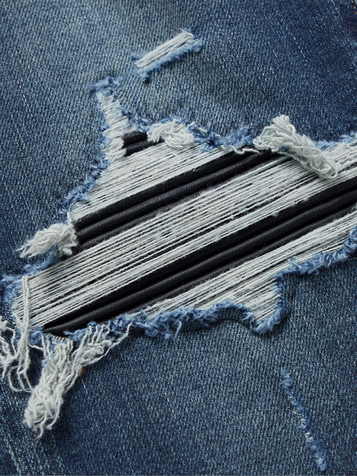 Amiri Mx1 Skinny-fit Panelled Distressed Jeans In Blue