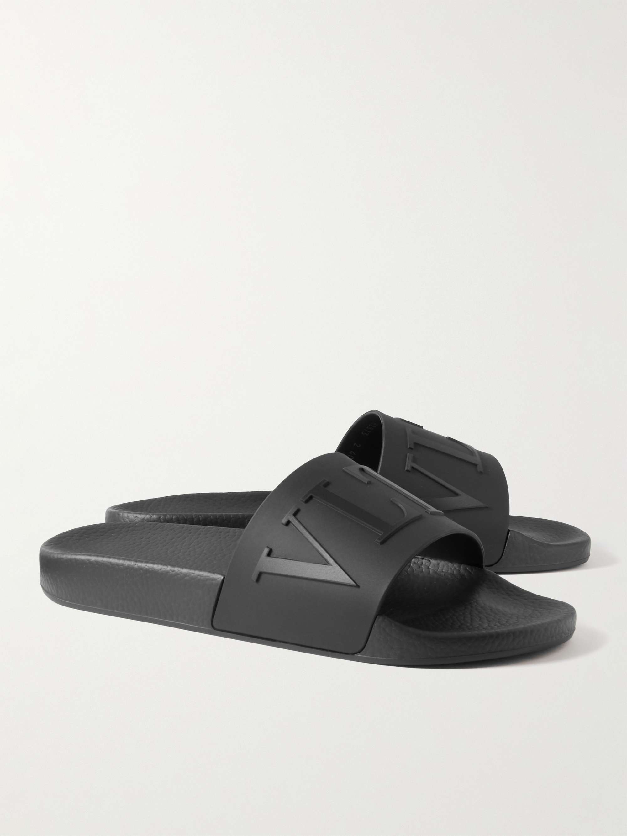 VALENTINO GARAVANI Valentino Garavani Logo-Embossed Rubber Slides