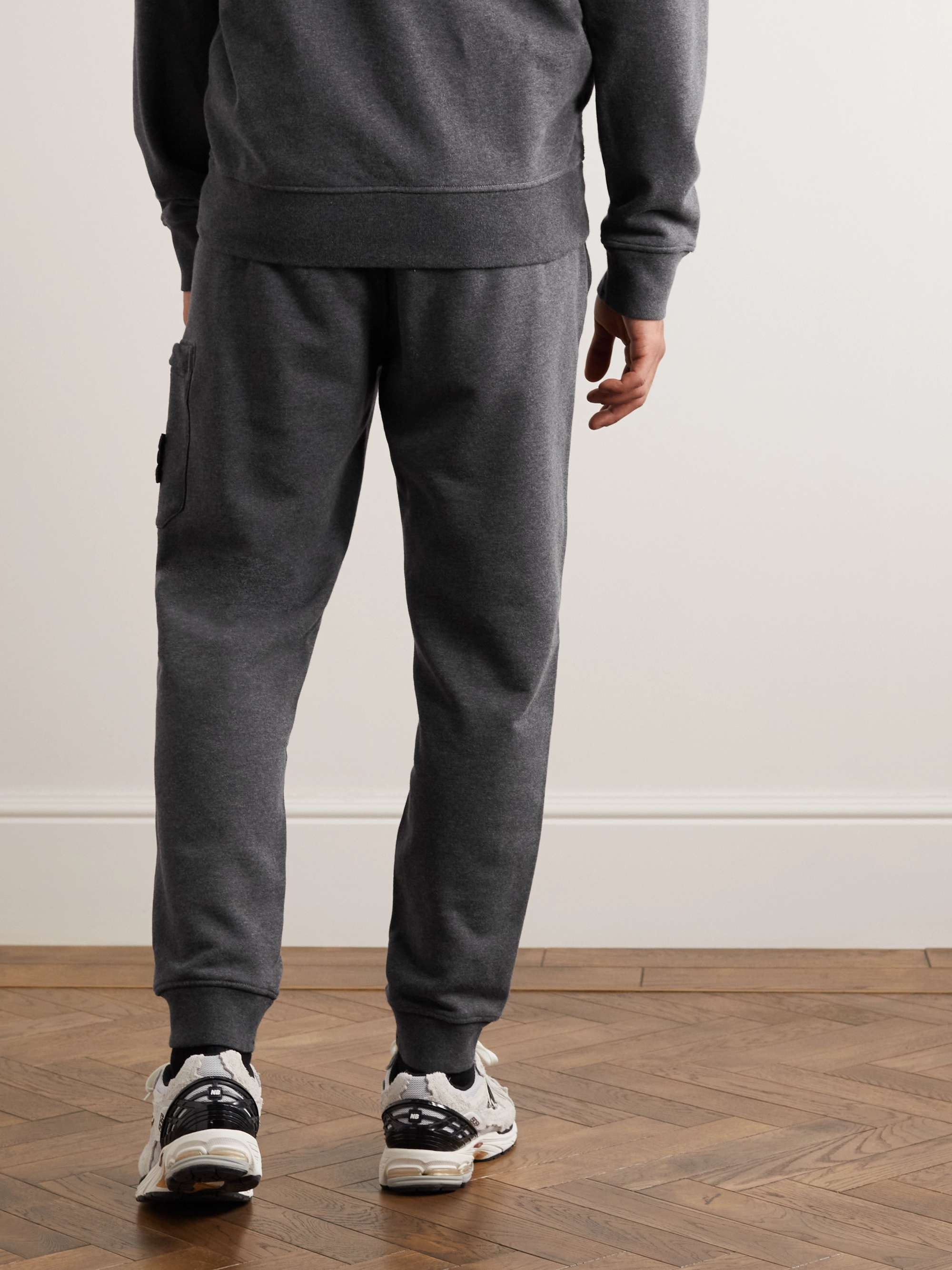 STONE ISLAND Tapered Logo-Appliquéd Garment-Dyed Cotton-Jersey Sweatpants