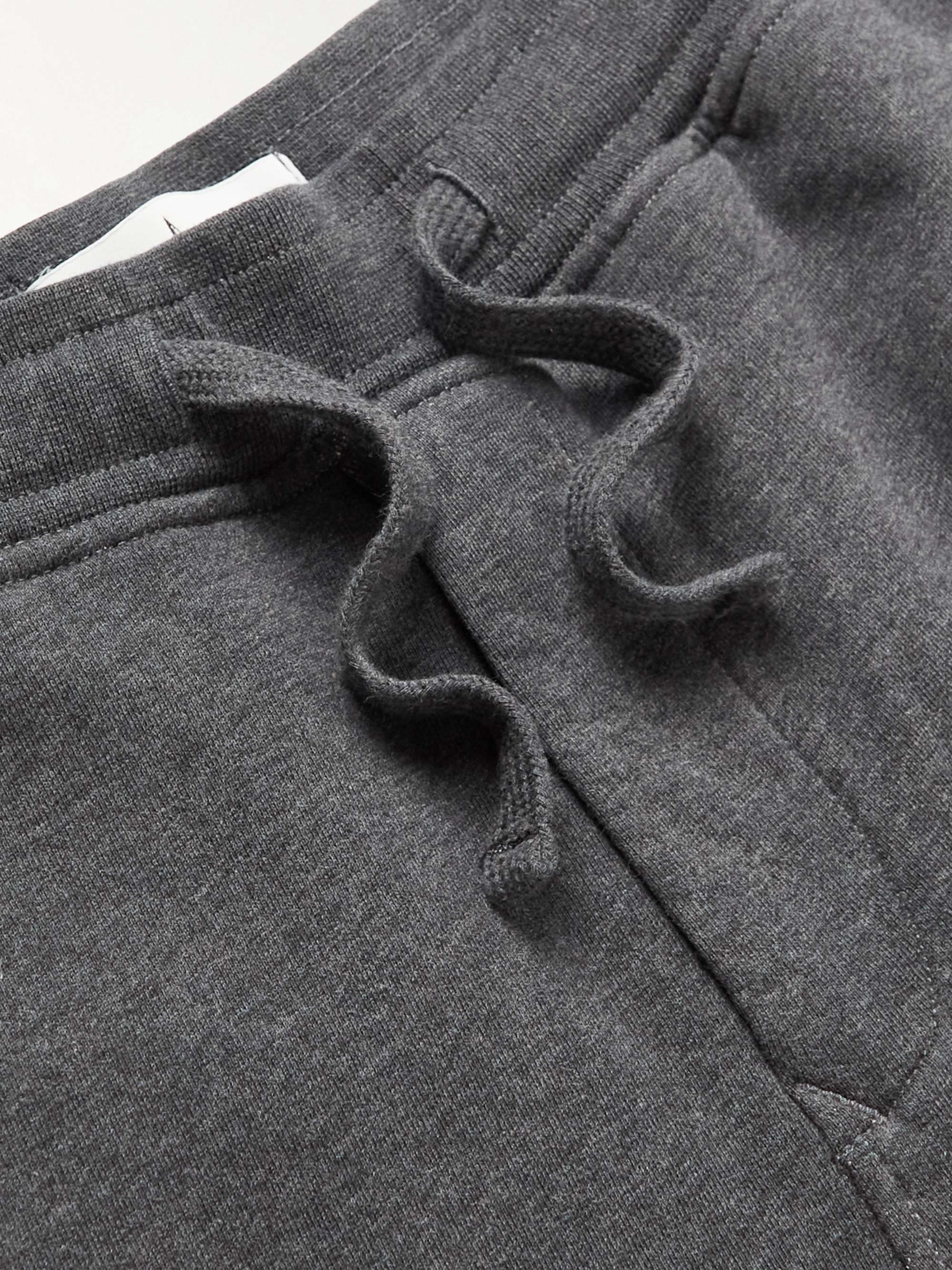 STONE ISLAND Tapered Logo-Appliquéd Garment-Dyed Cotton-Jersey Sweatpants