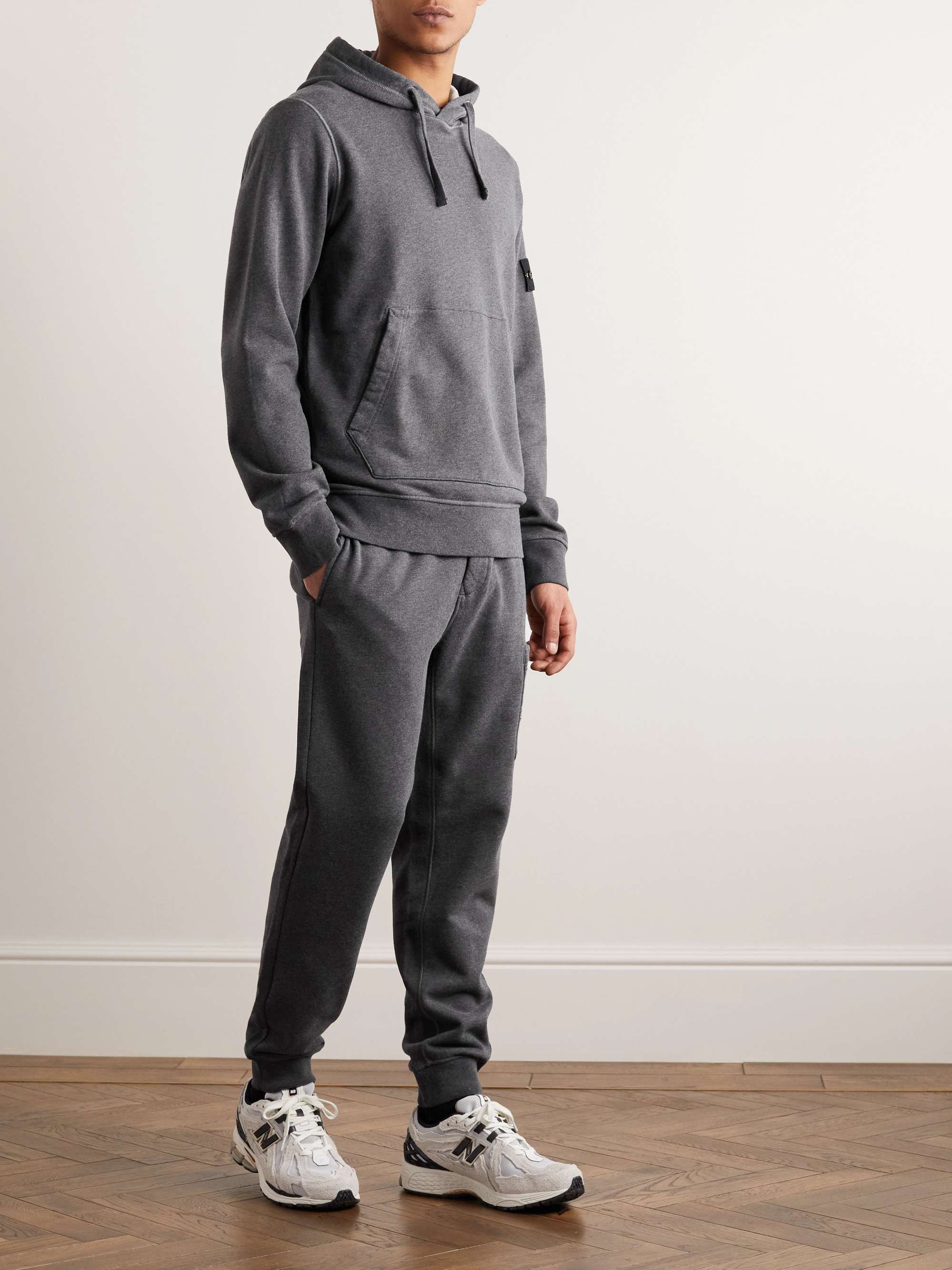 STONE ISLAND Tapered Logo-Appliquéd Garment-Dyed Cotton-Jersey Sweatpants