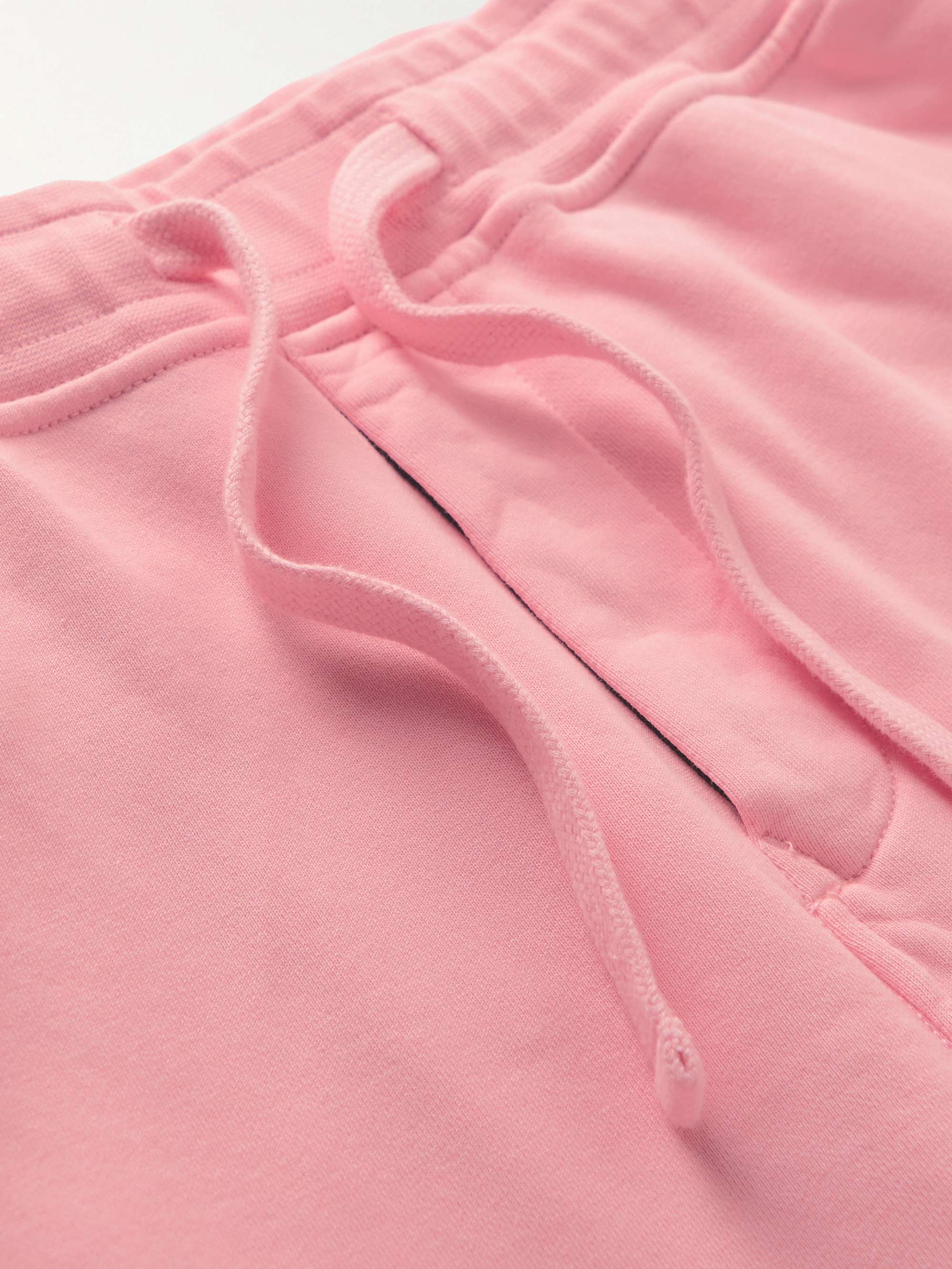 STONE ISLAND Tapered Logo-Appliquéd Garment-Dyed Cotton-Jersey Sweatpants