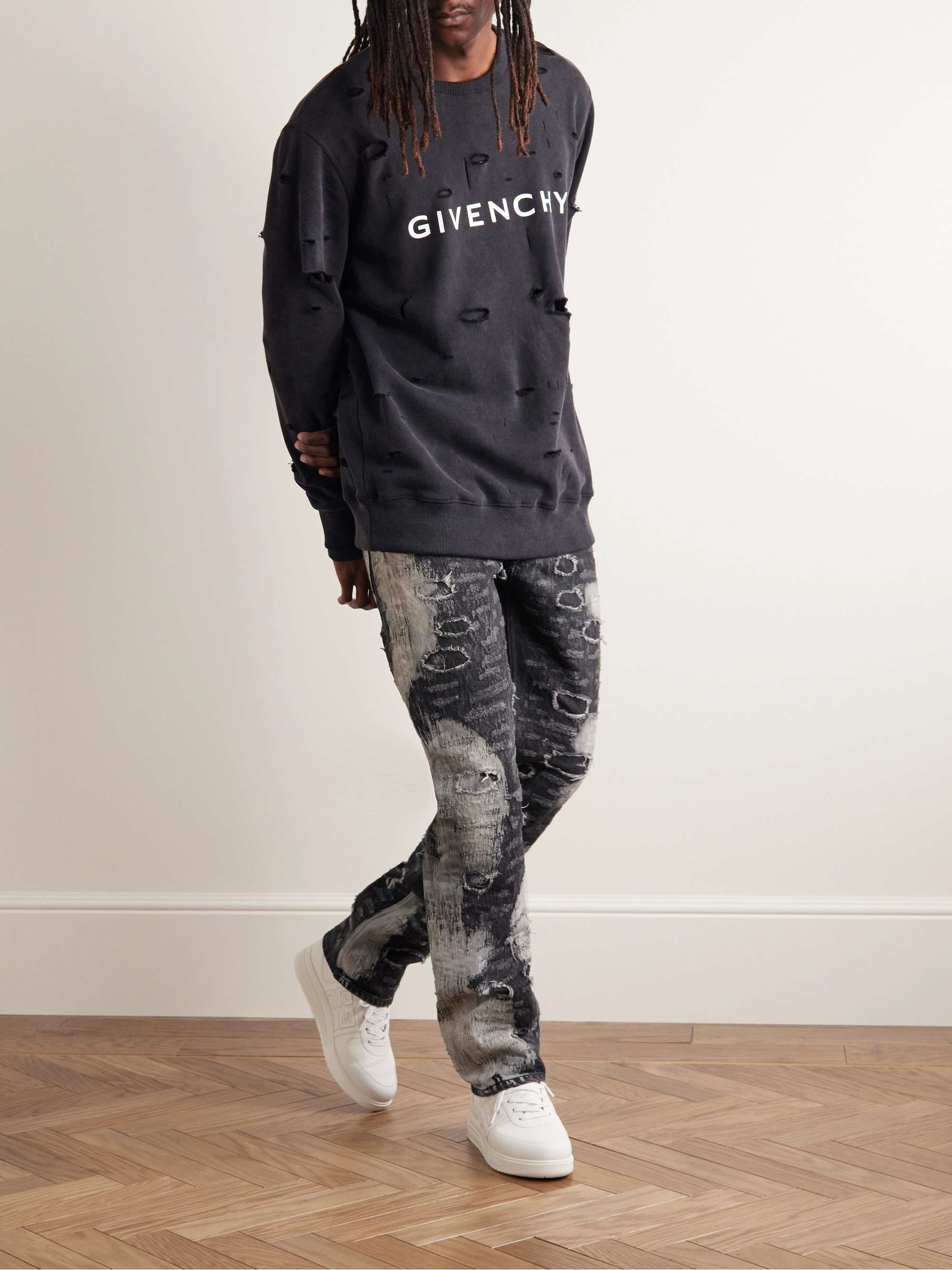 GIVENCHY Distressed denim and satin straight-leg pants