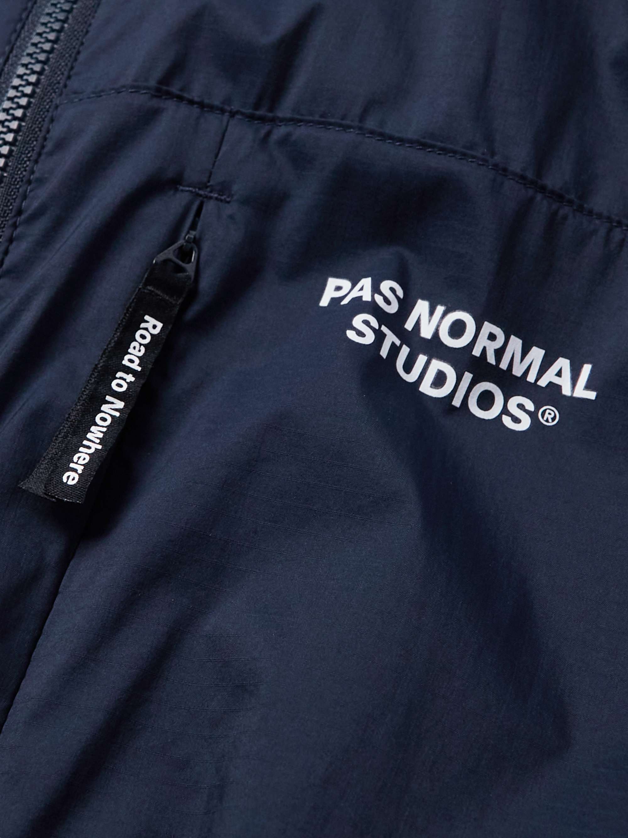PAS NORMAL STUDIOS Stow Away Slim-Fit Logo-Print Cycling Jacket