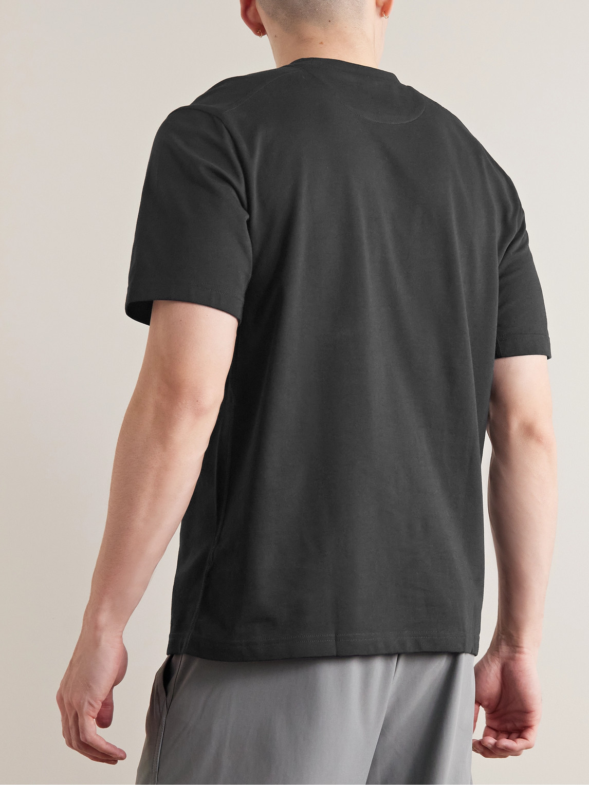 Shop Nike Primary Cotton-blend Dri-fit T-shirt In Black