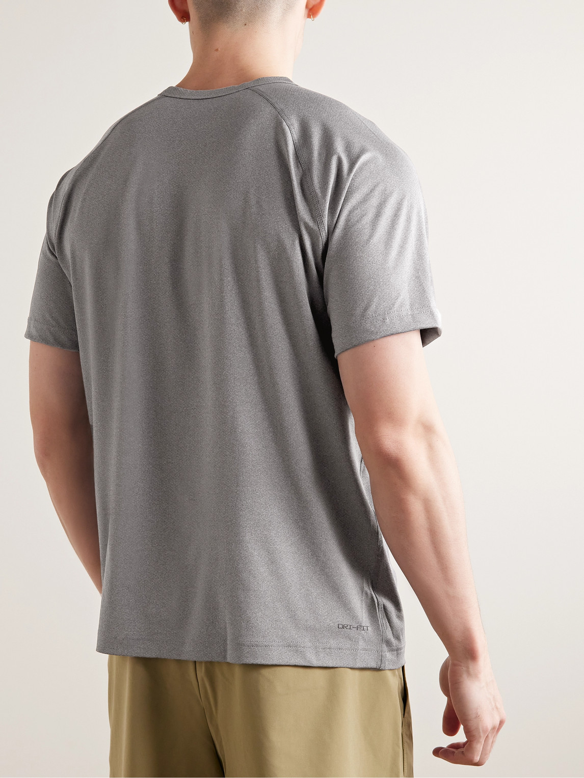 Shop Nike Logo-print Dri-fit T-shirt In Gray