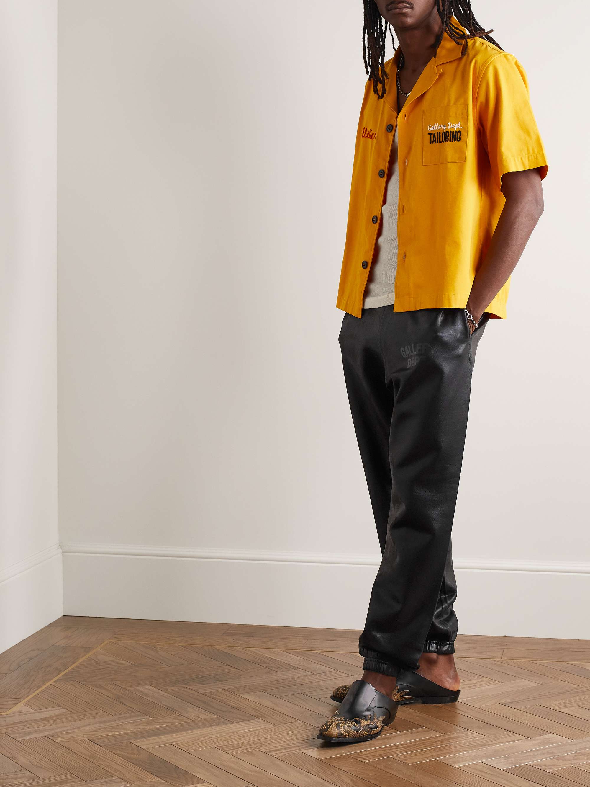 GALLERY DEPT. Analog Tapered Logo-Print Coated Cotton-Jersey Sweatpants