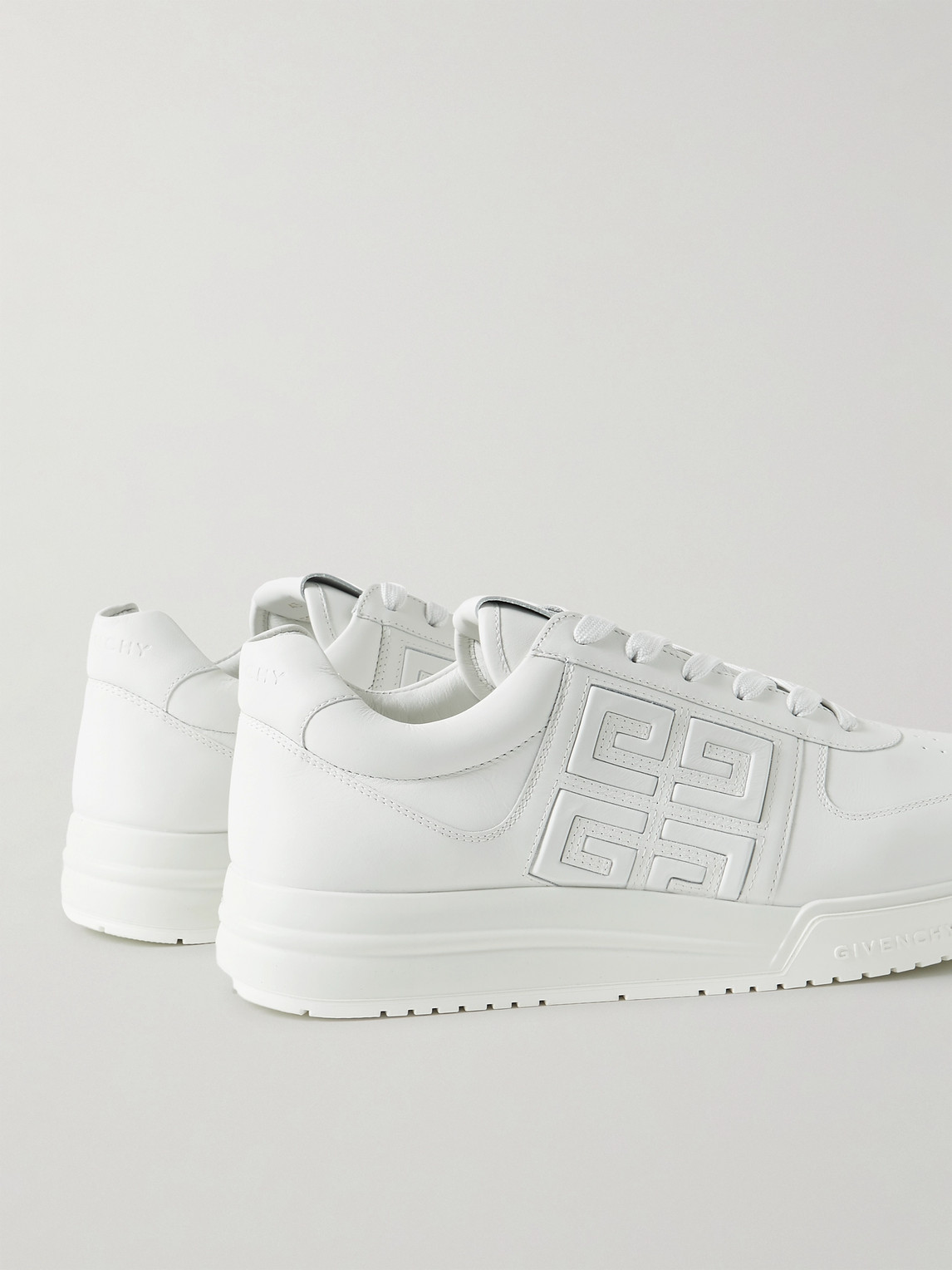 Shop Givenchy G4 Logo-embossed Leather Sneakers In White